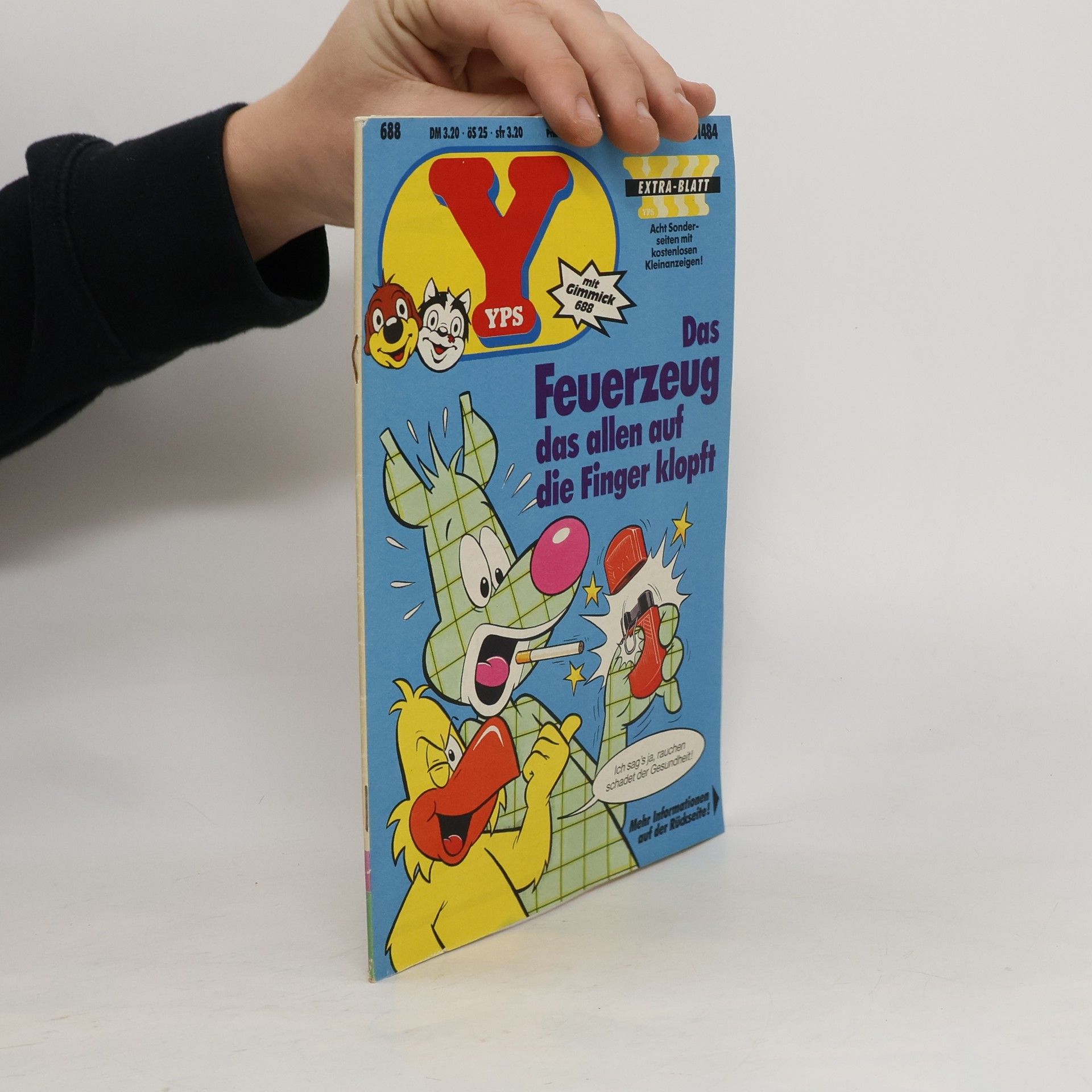 kolektiv YPS. Das Feuerzeug das allen auf die Finger klopft