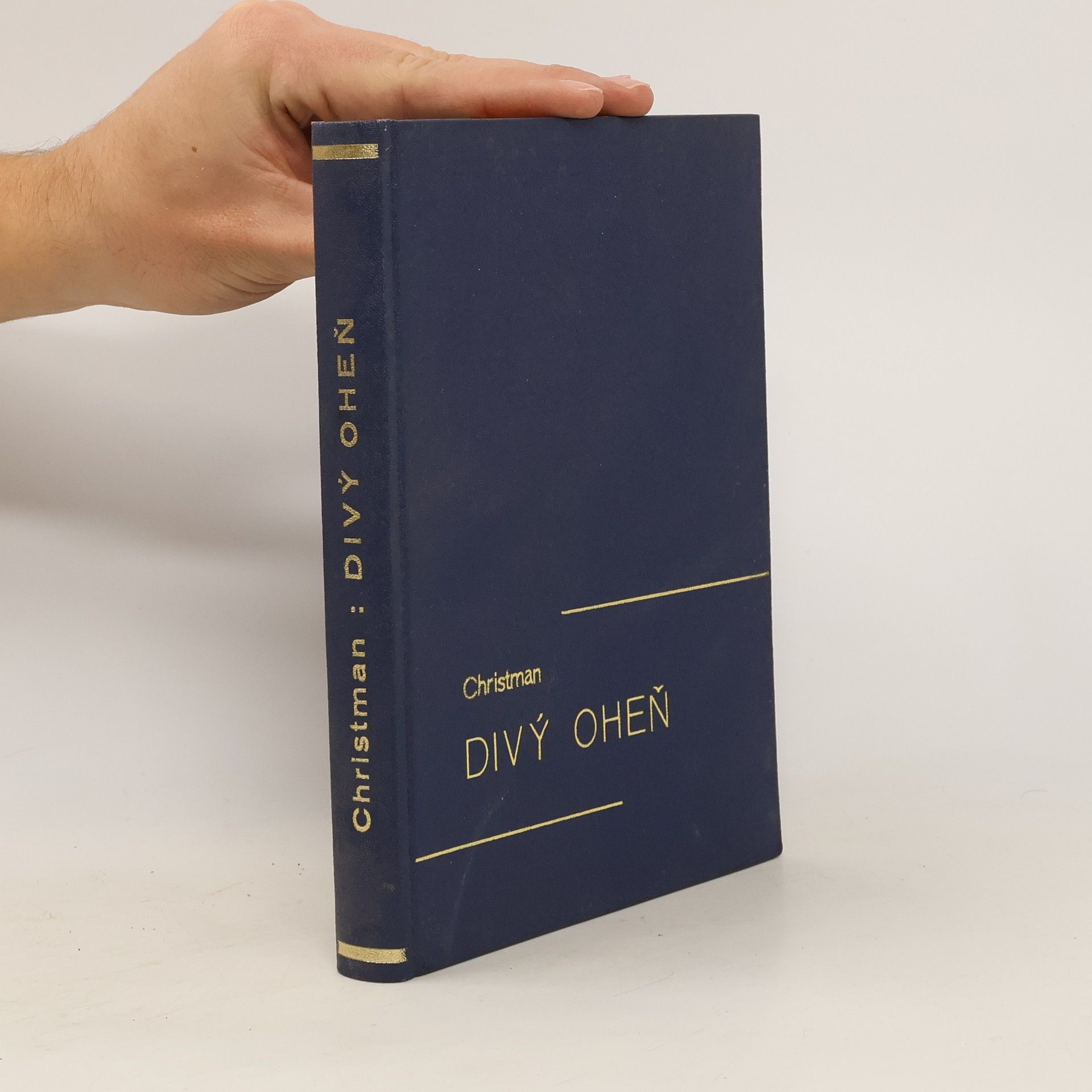 Don. R. Christman Divý oheň