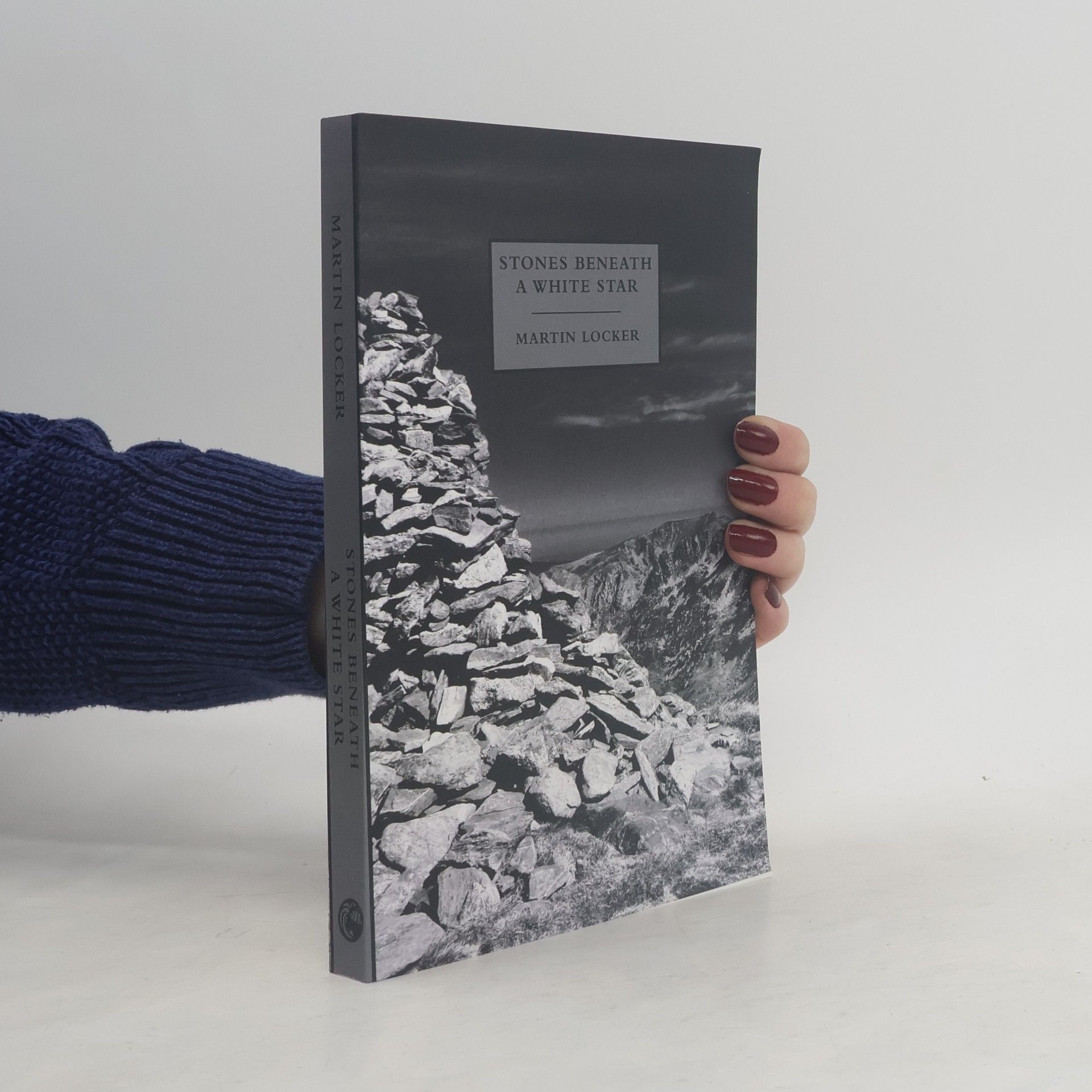 Martin Locker Stones beneath a white star