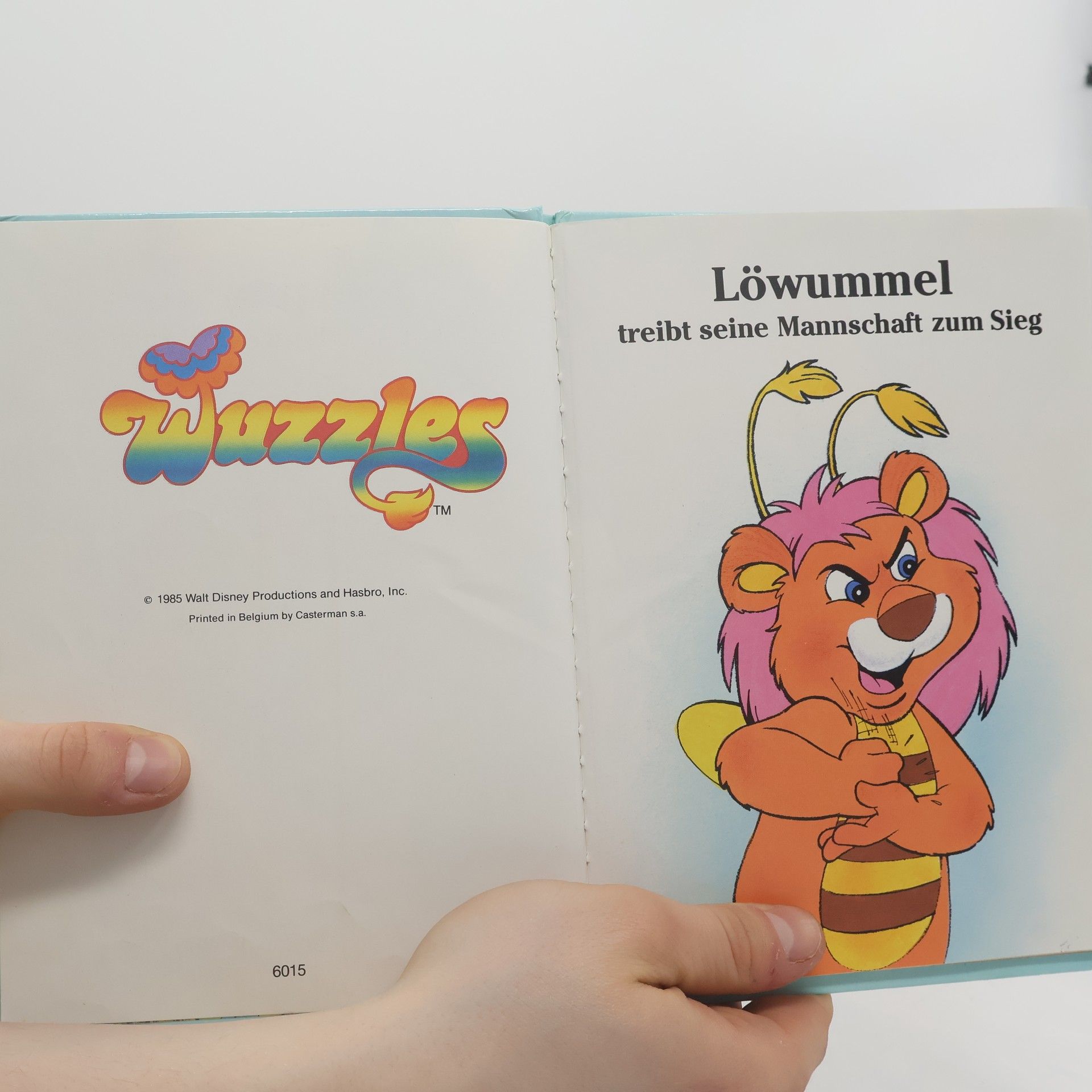 kolektiv Wuzzles. Löwummel treibt seine Mannschaft zum Sieg