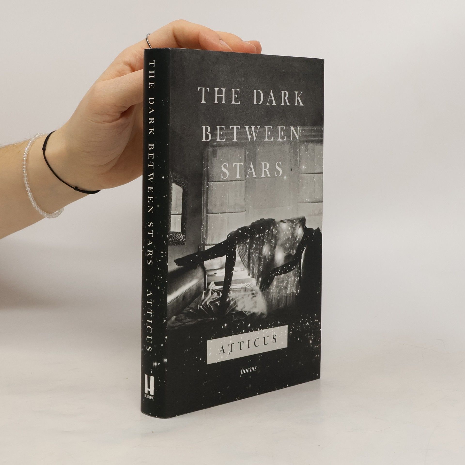 Atticus The dark between stars: Poems