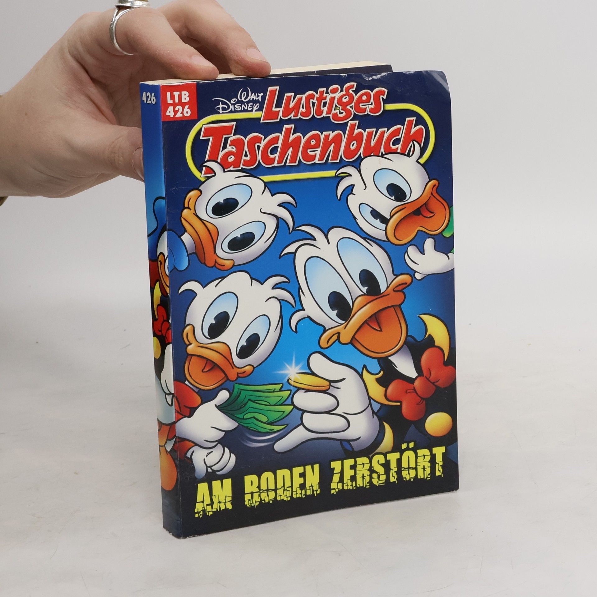 Walt Disney Lustiges Taschenbuch 426. Am Boden Zebstöbt