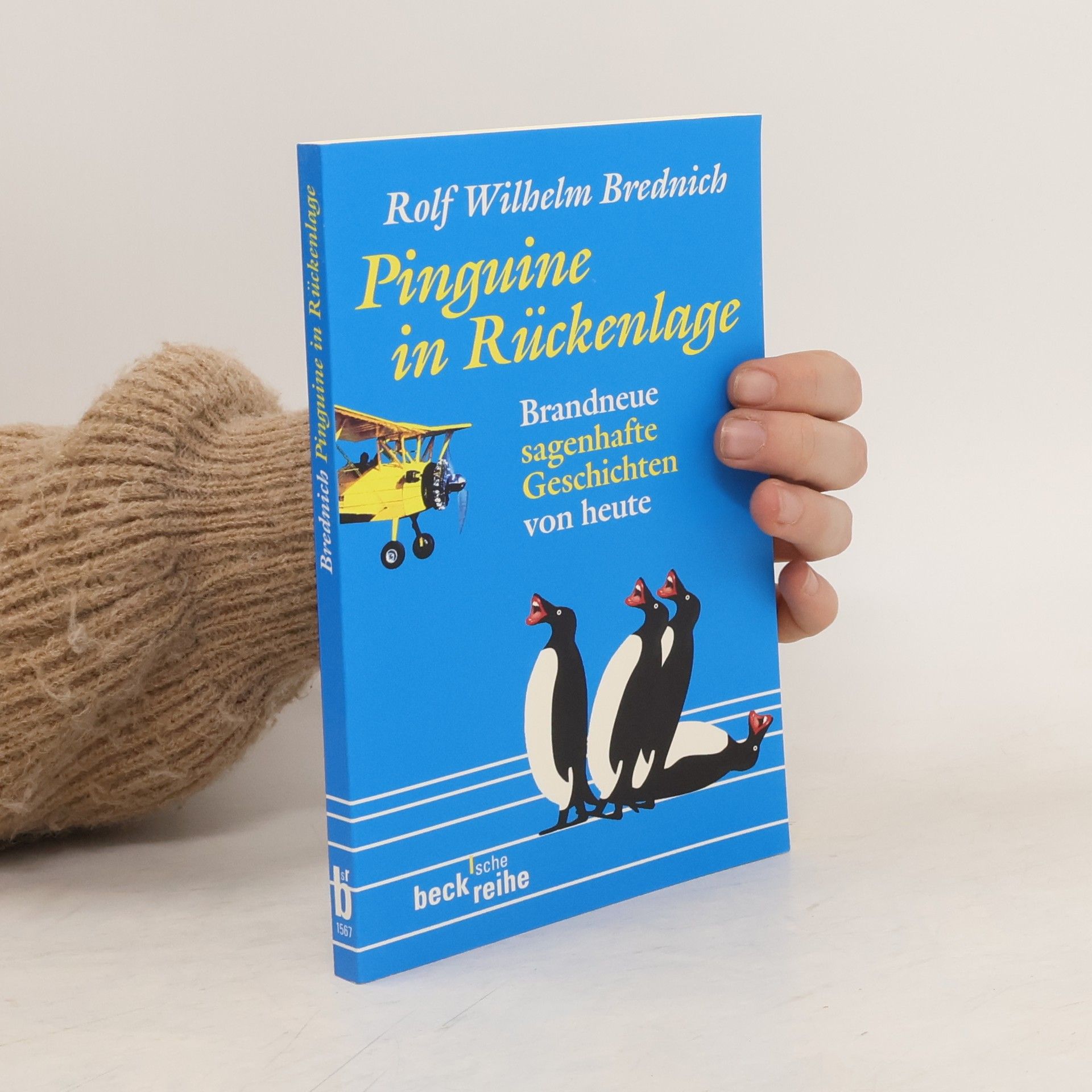 Rolf Wilhelm Brednich Pinguine in Rückenlage