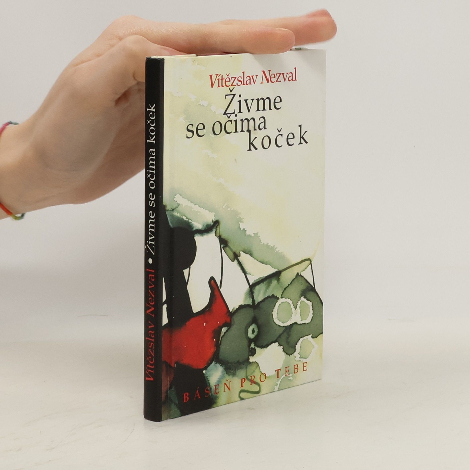 Vítězslav Nezval Živme se očima koček