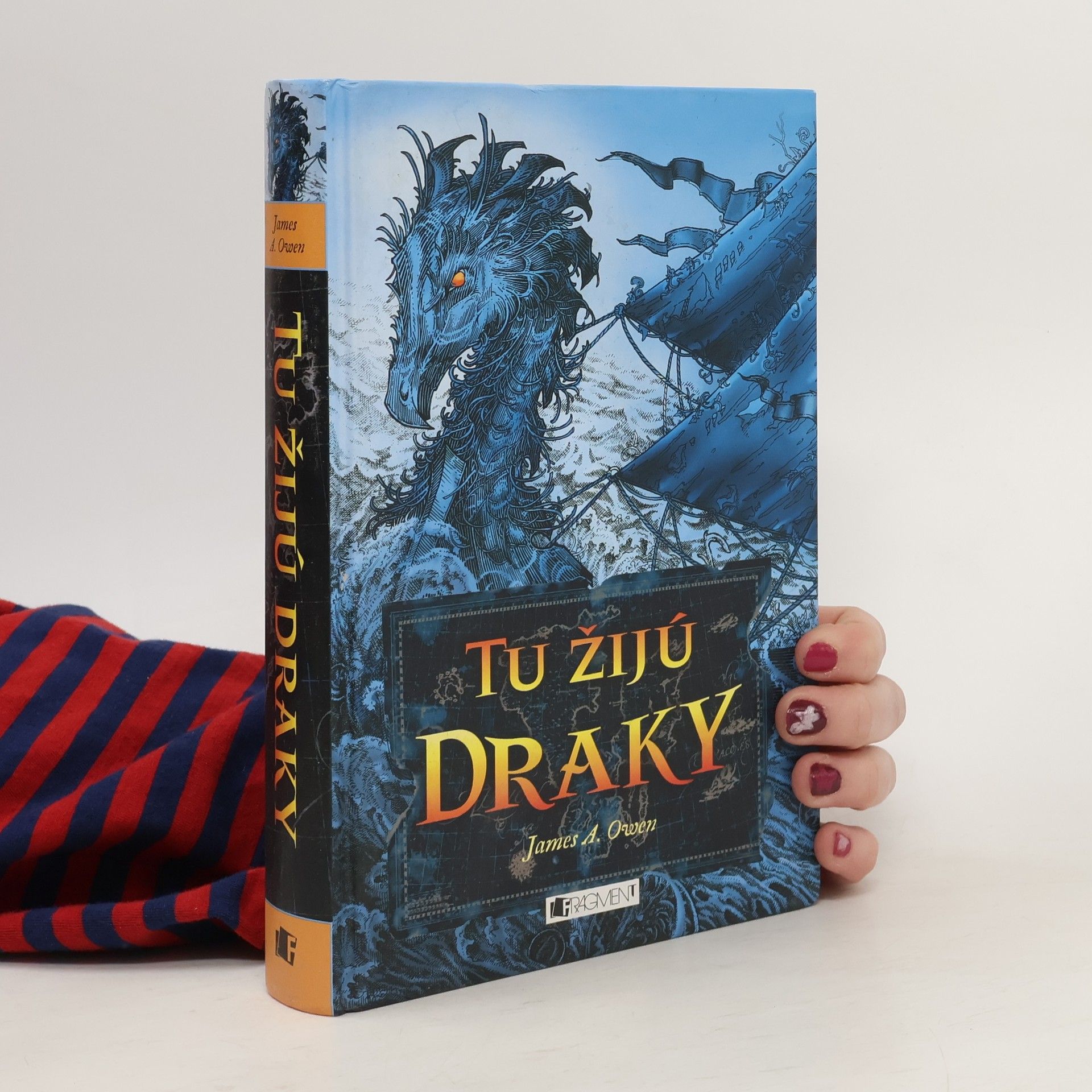 James A. Owen Tu žijú draky