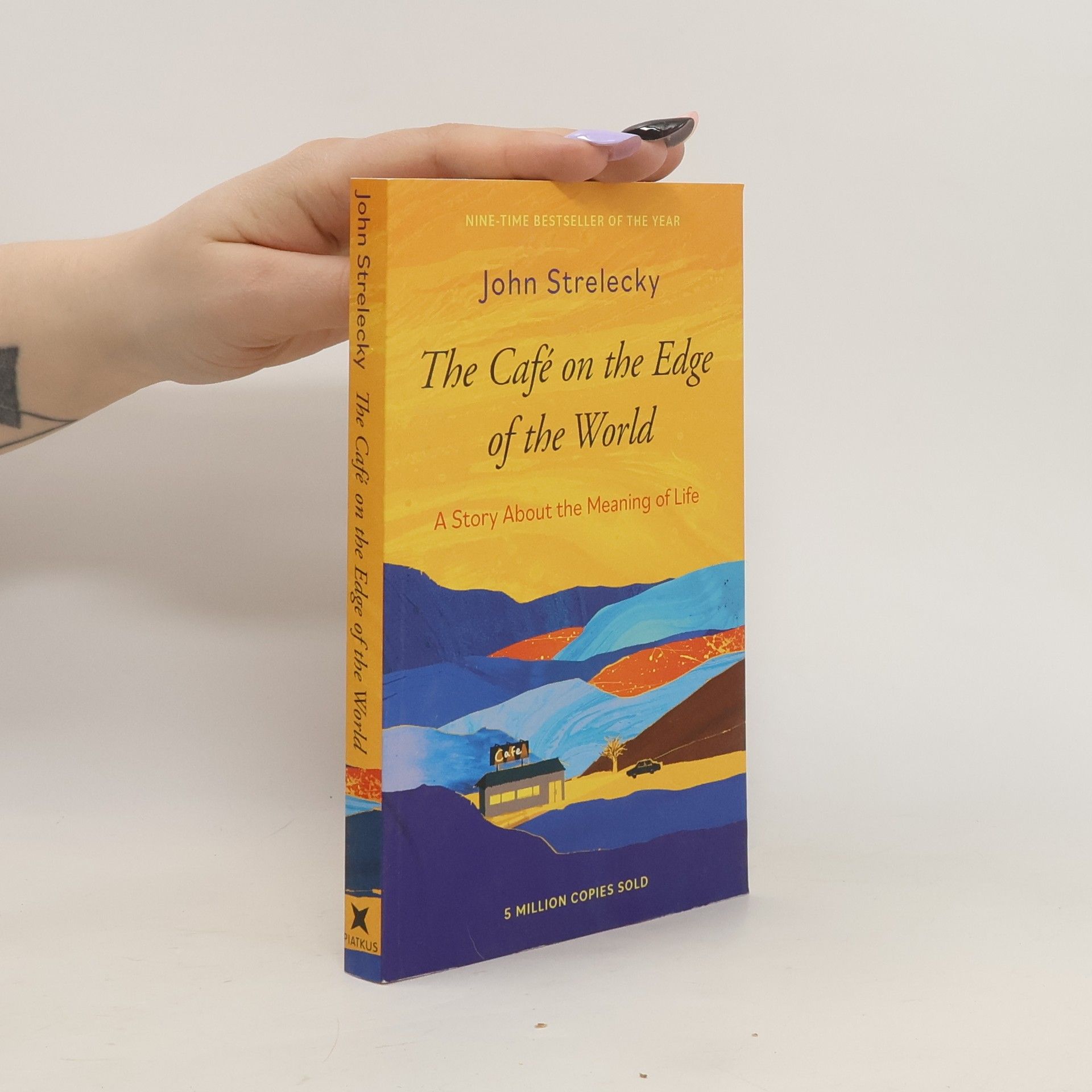 John P. Strelecky The Café on the Edge of the World