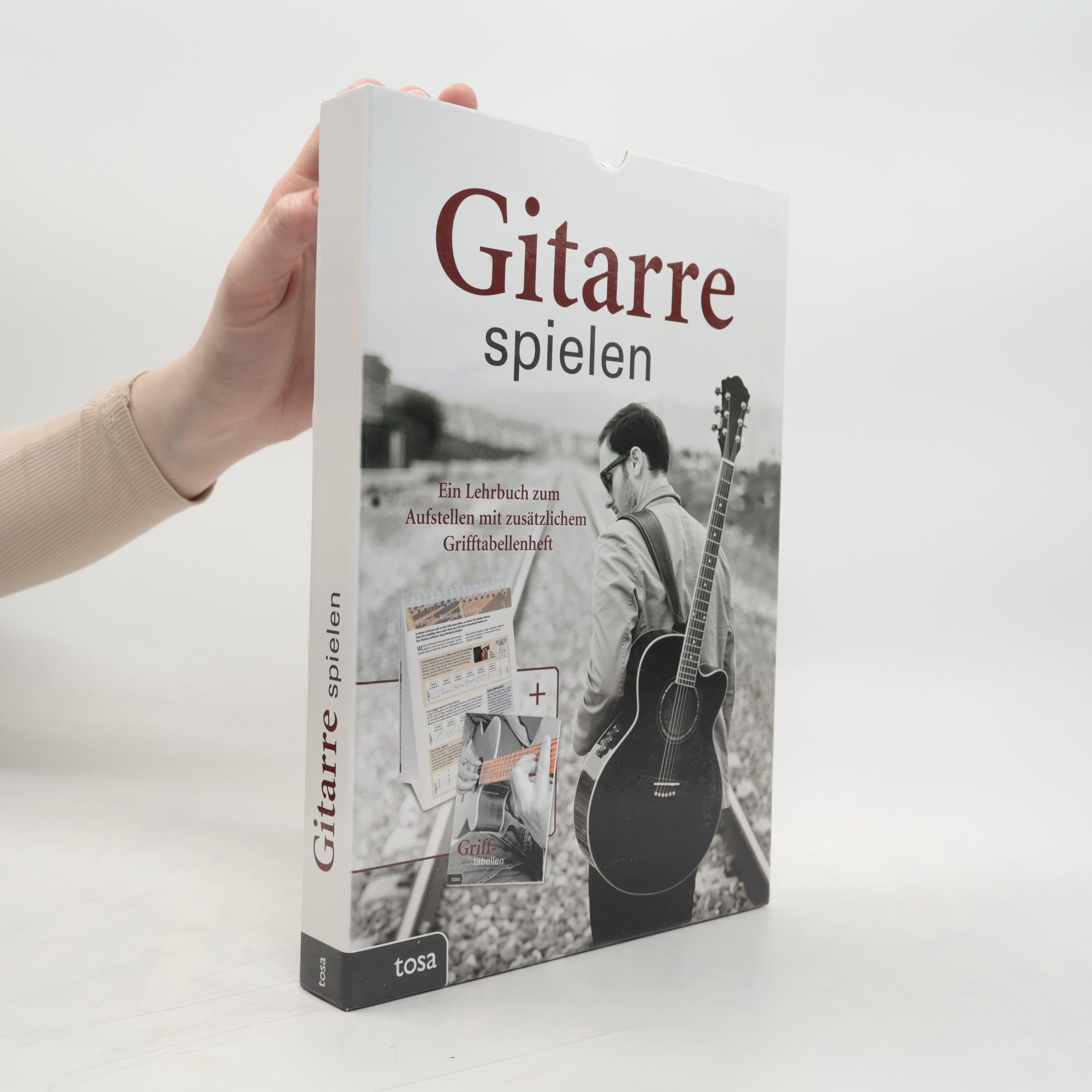 tosa GmbH Gitarre spielen