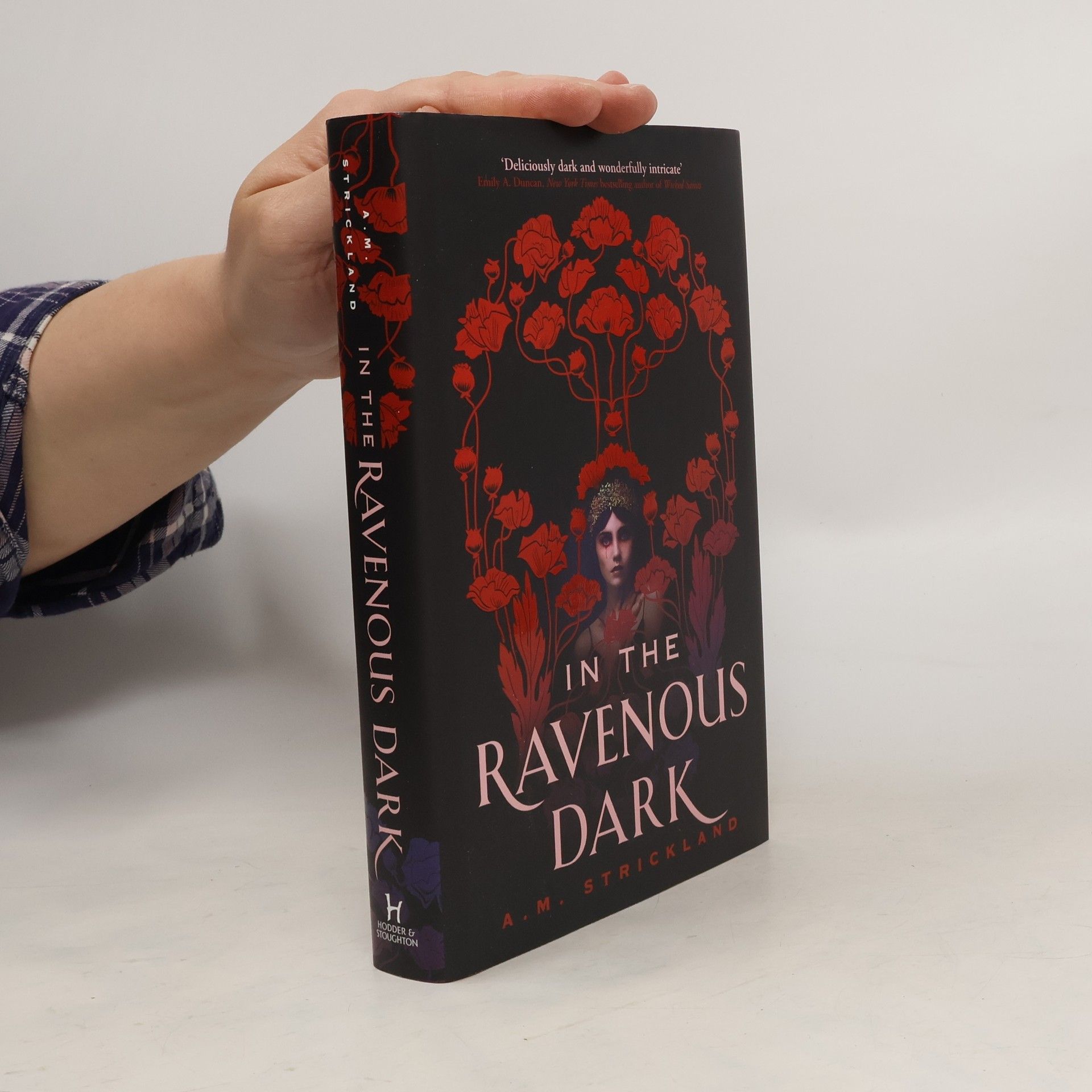 A. M. Strickland In The Ravenous Dark