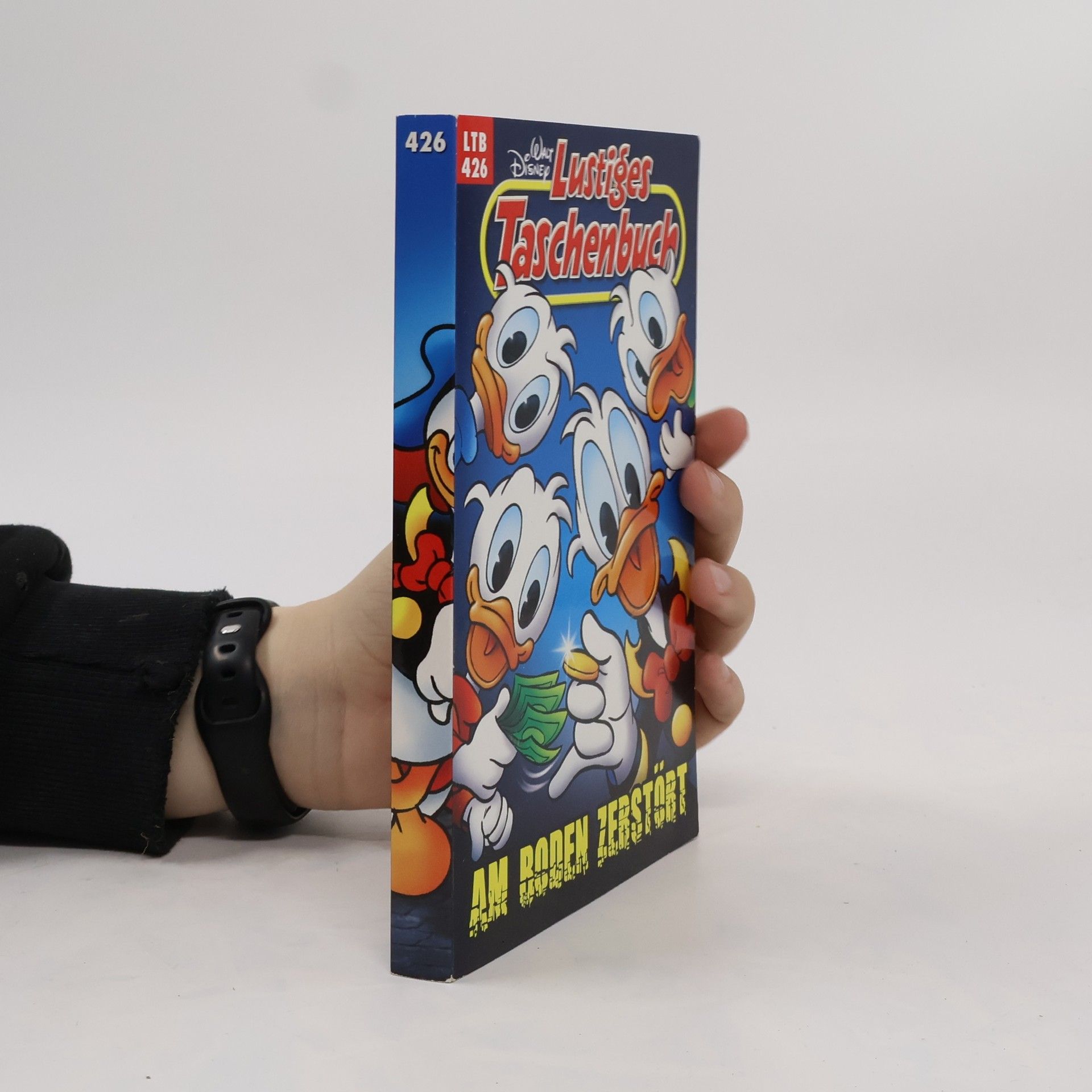 Walt Disney Lustiges Taschenbuch 426. Am Boden Zebstöbt