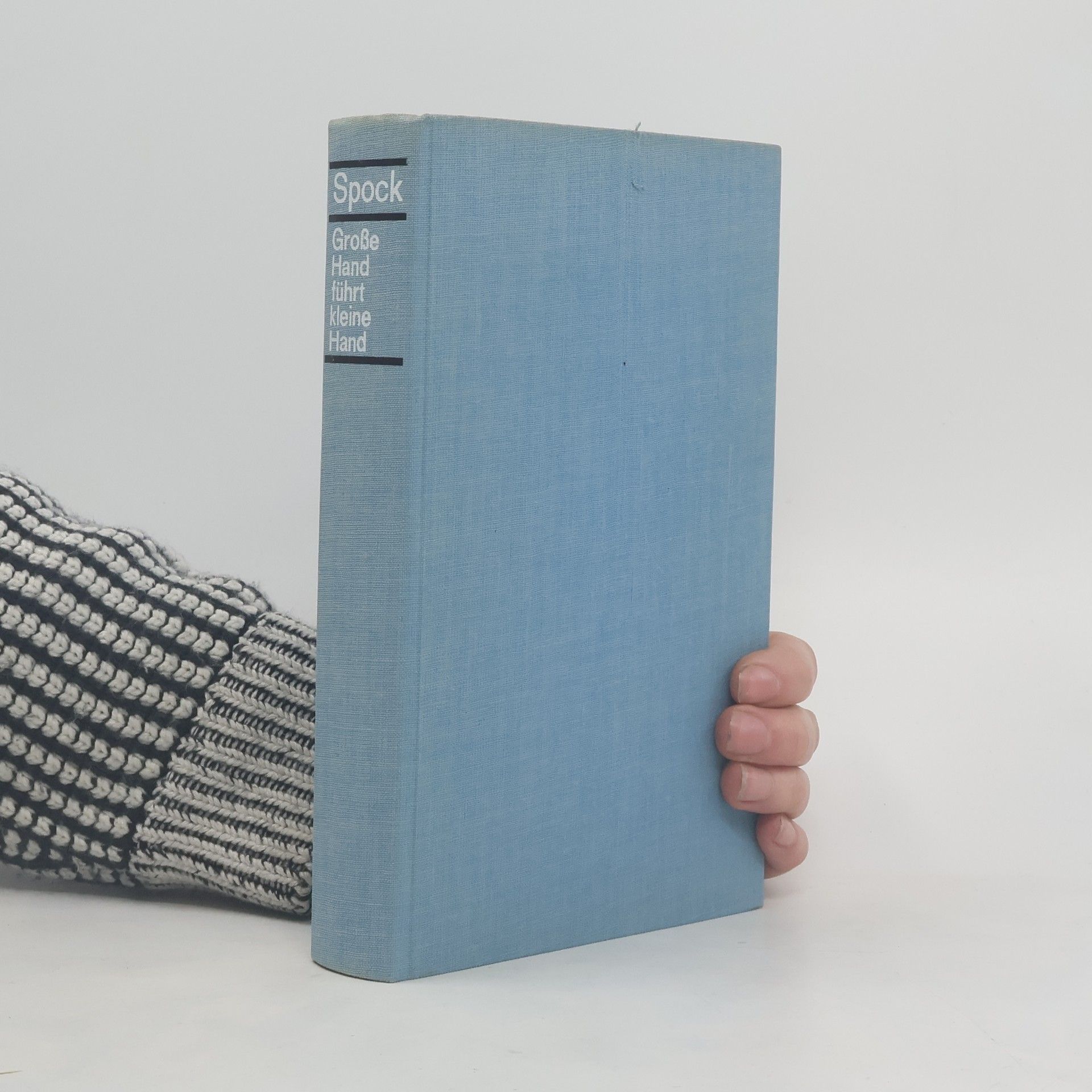 Benjamin Spock Große Hand führt kleine Hand
