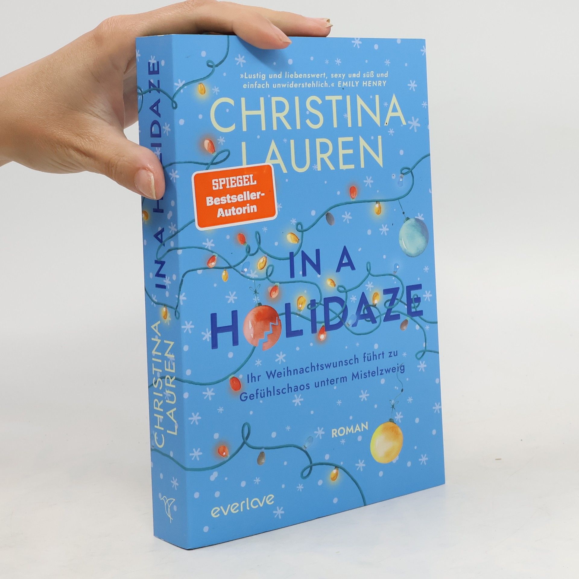 Christina Lauren In a Holidaze - Ihr Weihnachtswunsch führt zu Gefühlschaos unterm Mistelzweig