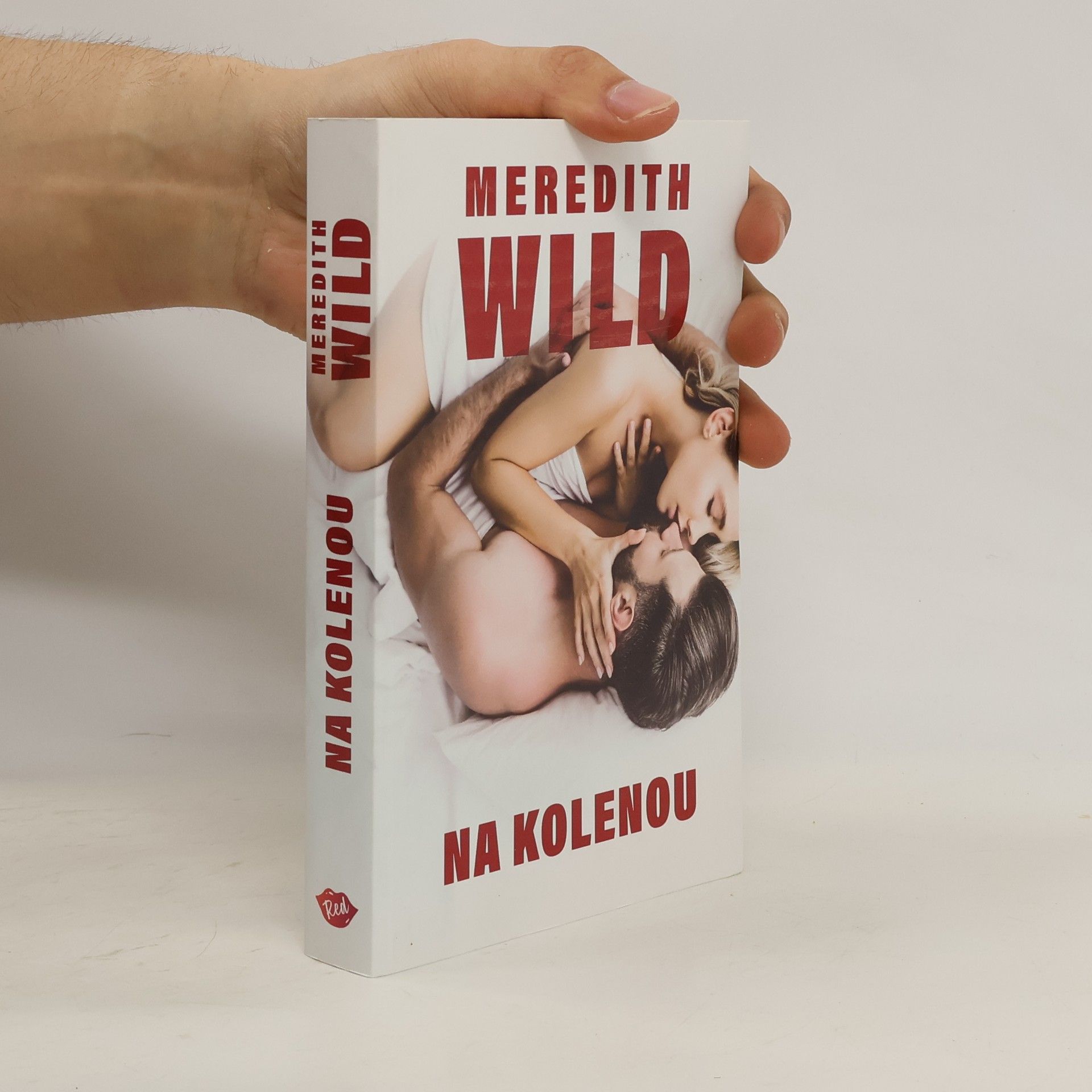 Meredith Wild Na kolenou