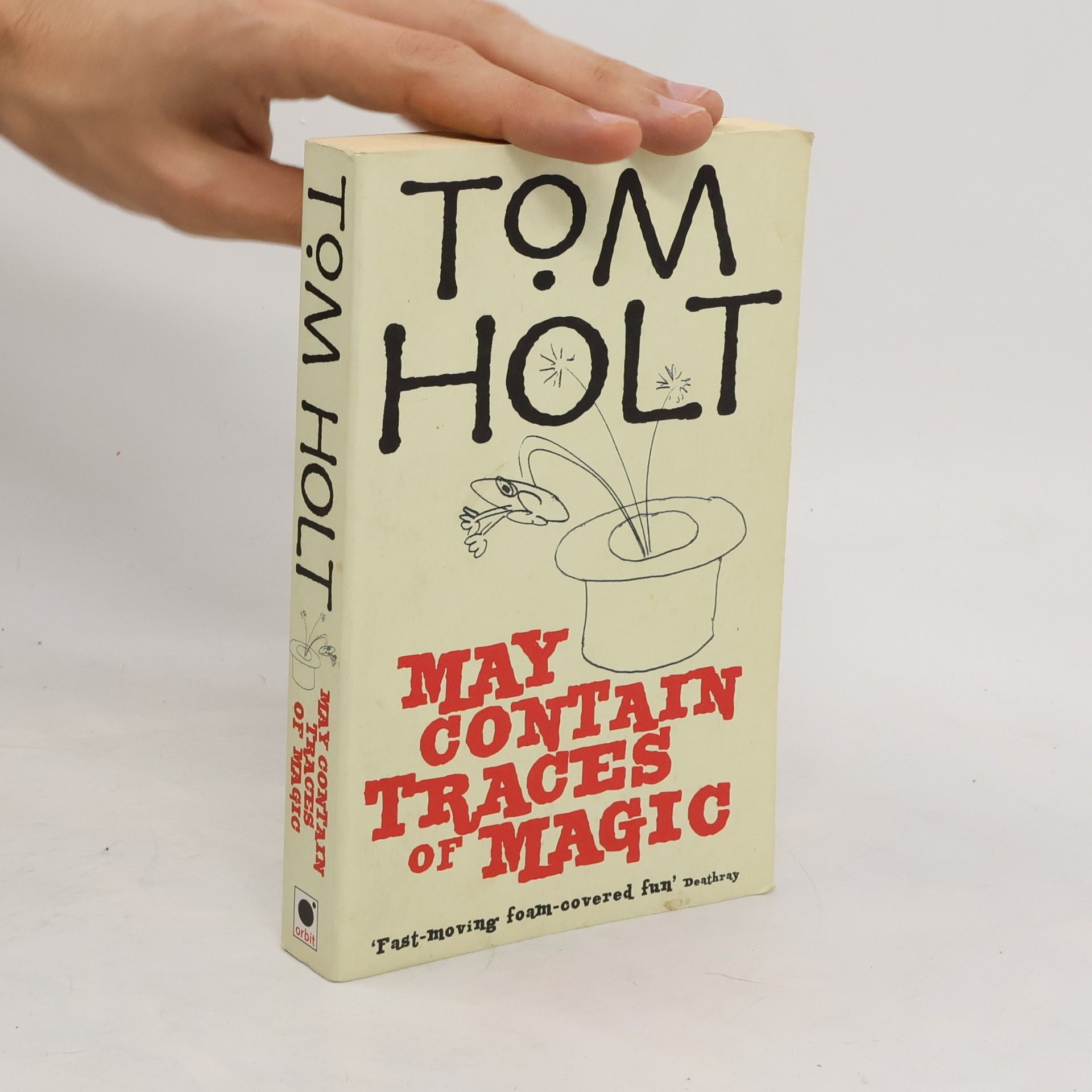 Tom Holt May contain traces of magic