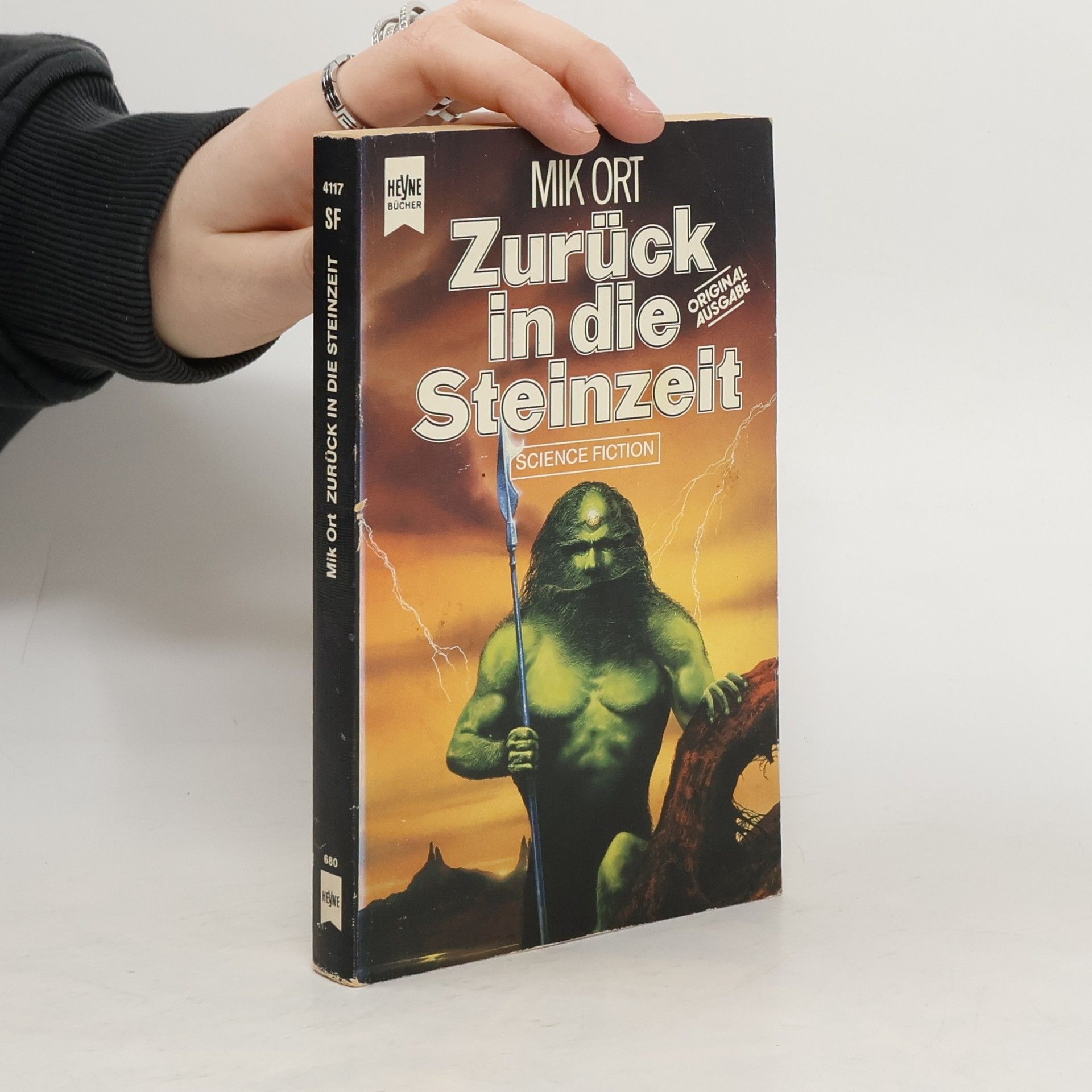Mit Ort Zurück in die Steinzeit. Science Fiction Roman.