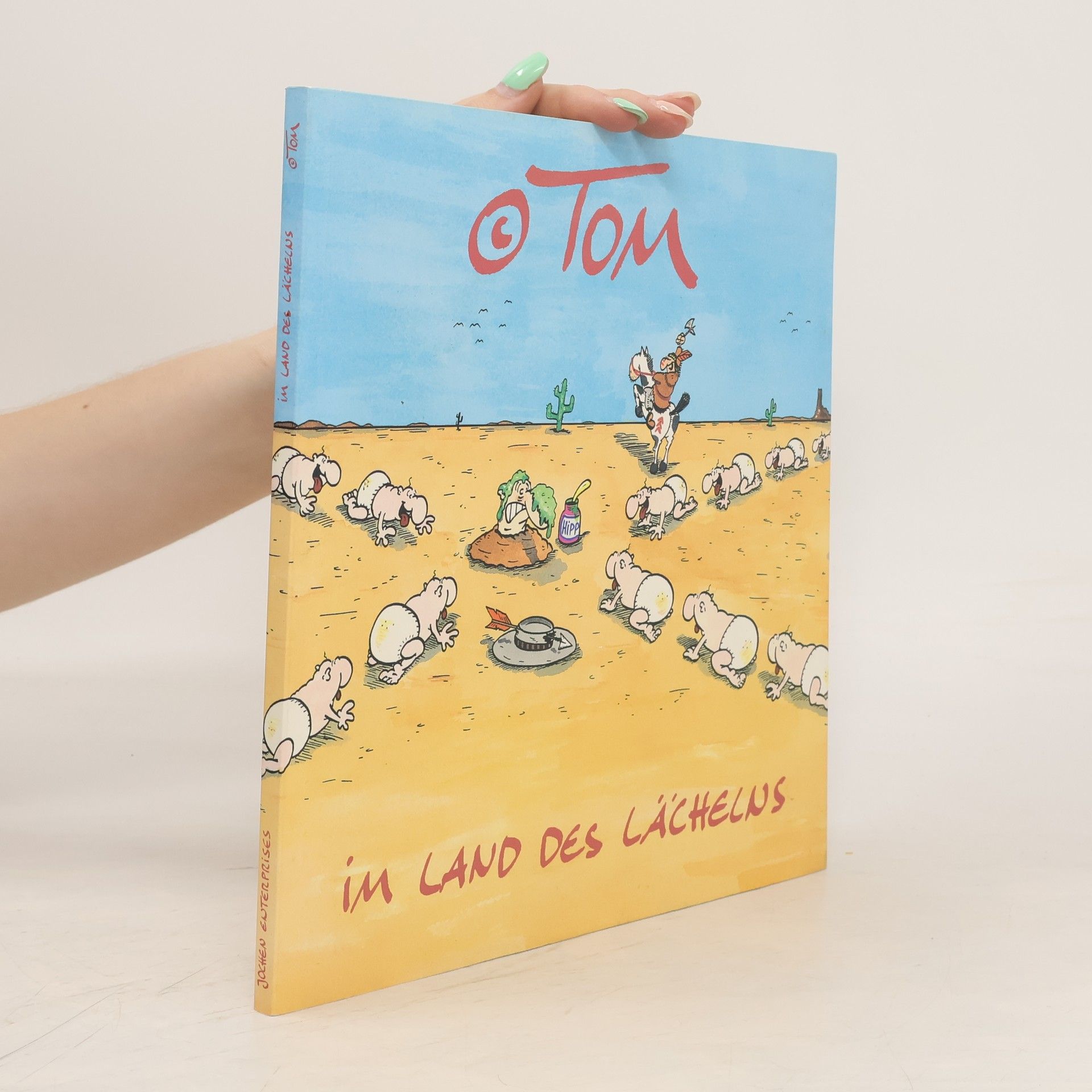 T. Om Im Land des Lächelns