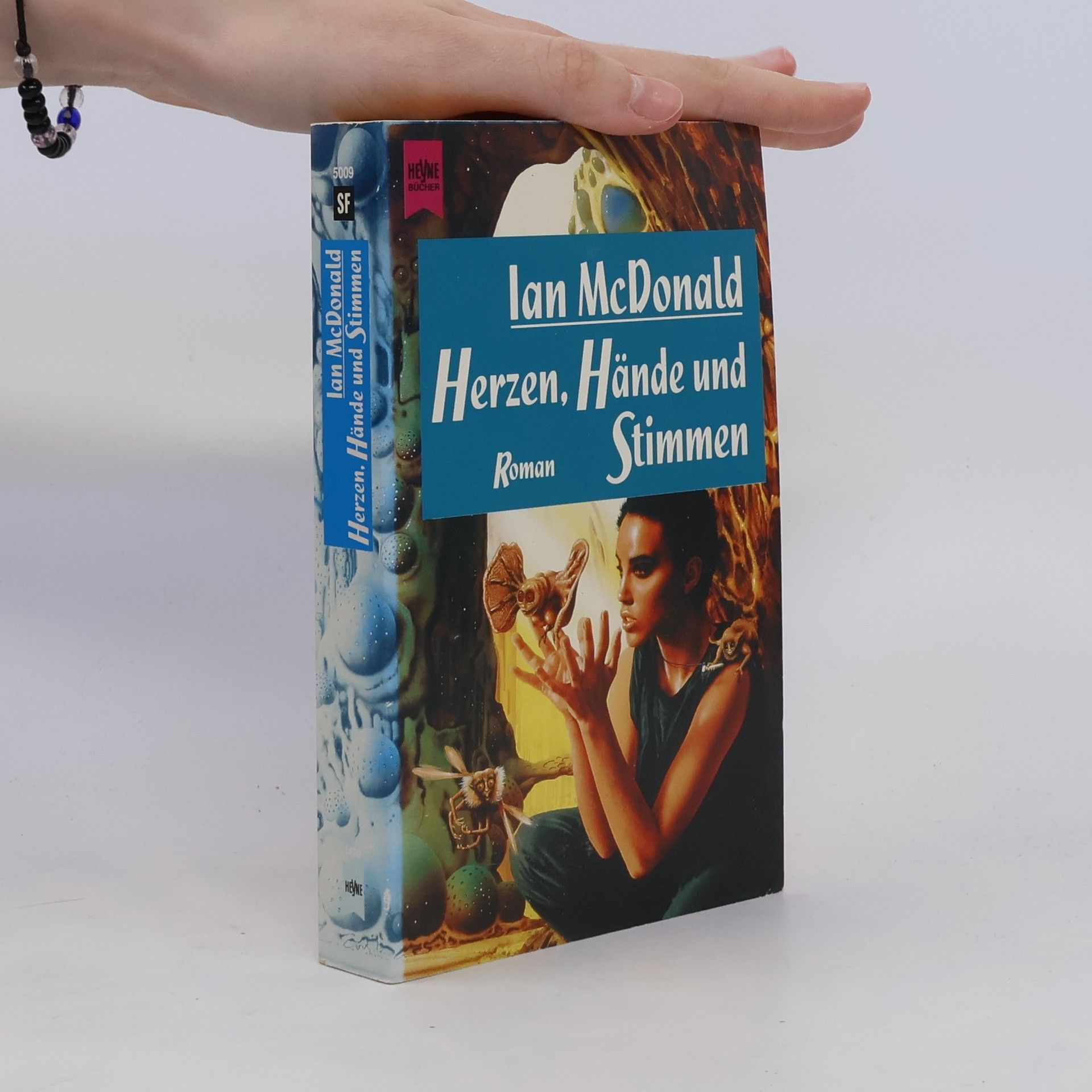 Ian McDonald Herzen, Hände und Stimmen. Roman.
