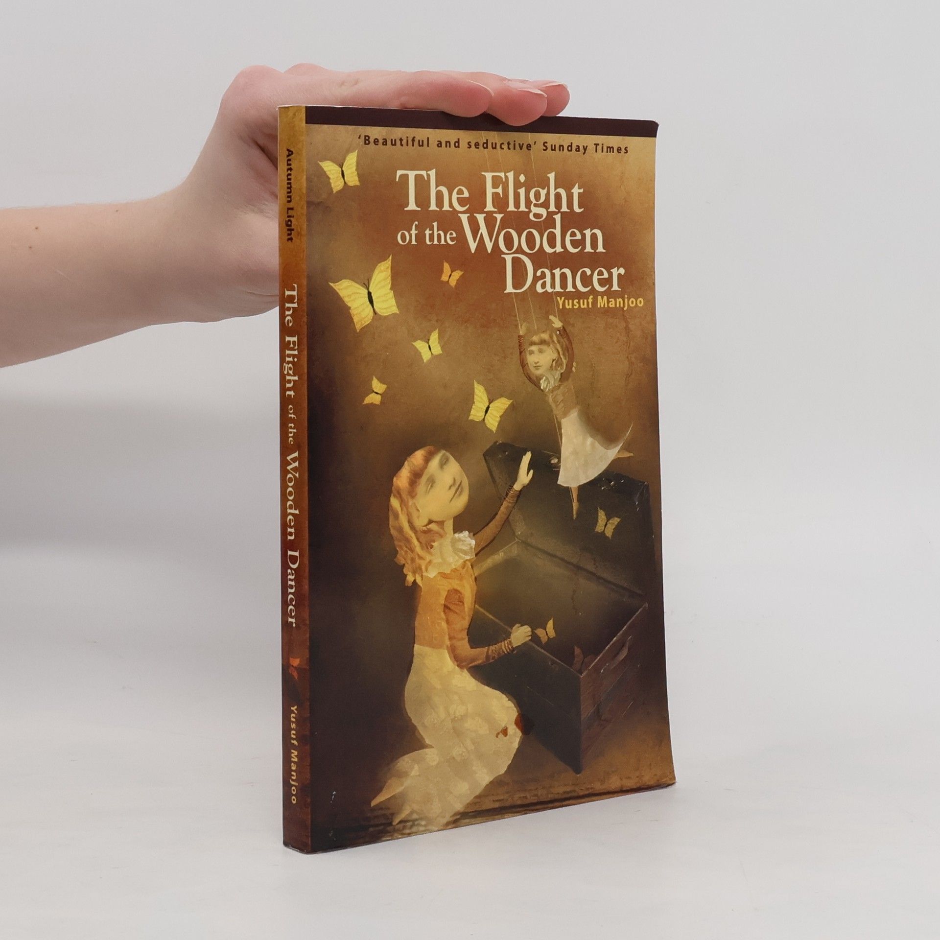 Yusuf Manjoo The Flight of the Wooden Dancer