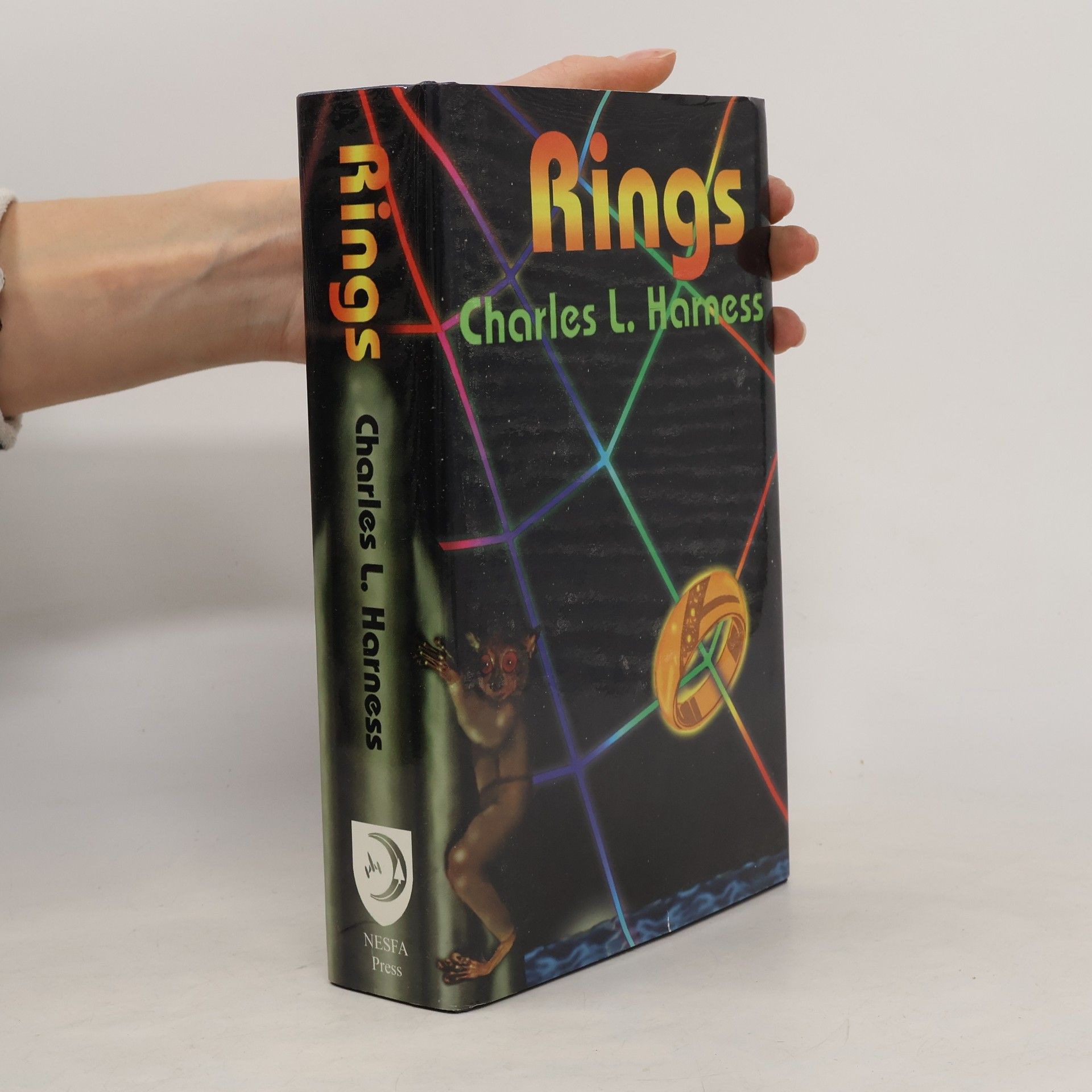Charles L. Harness Rings