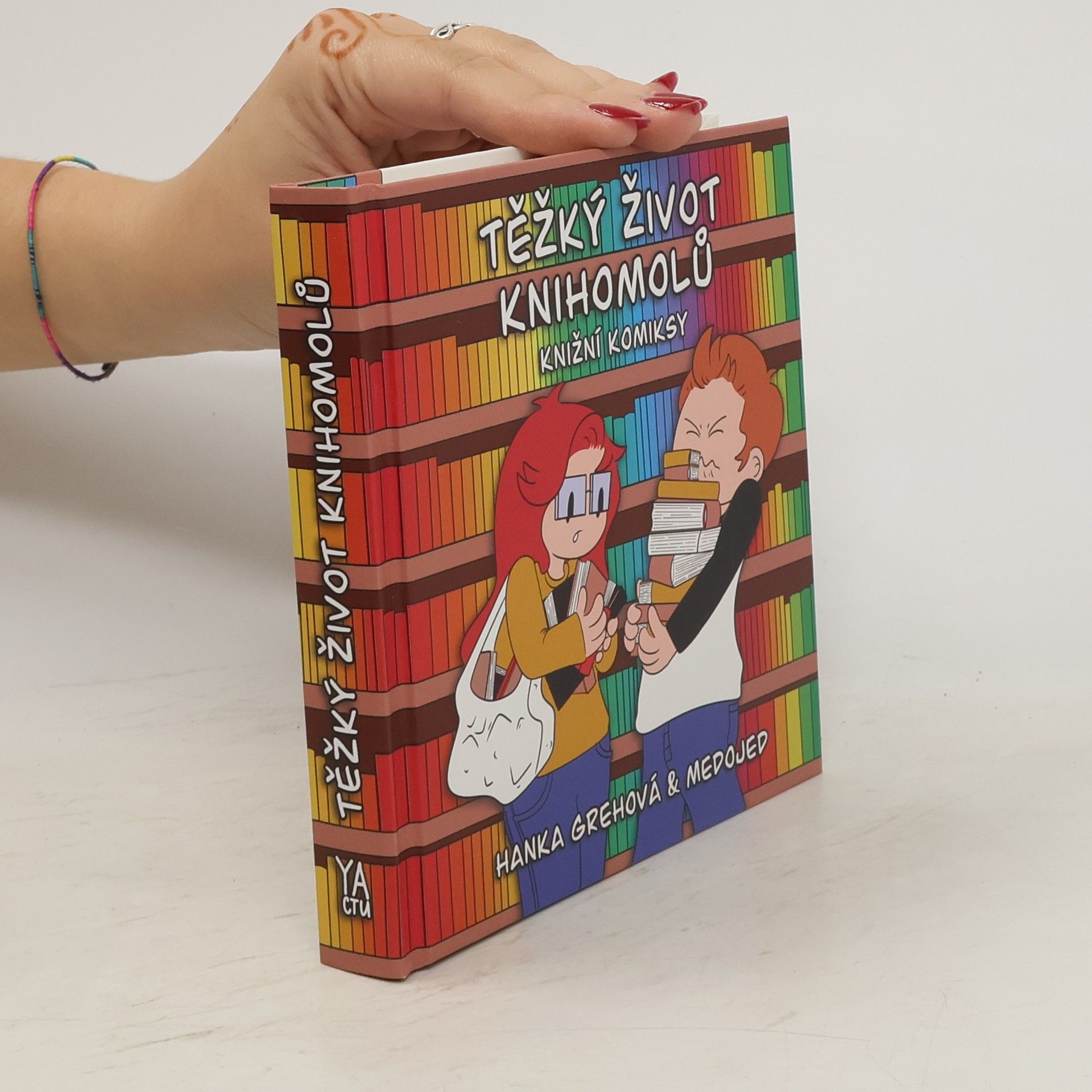 Medojed Těžký život knihomolů : knižní komiksy