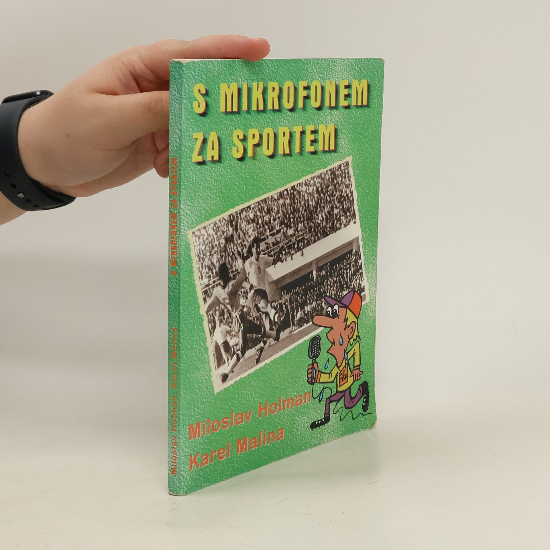 Miloslav Holman S mikrofonem za sportem