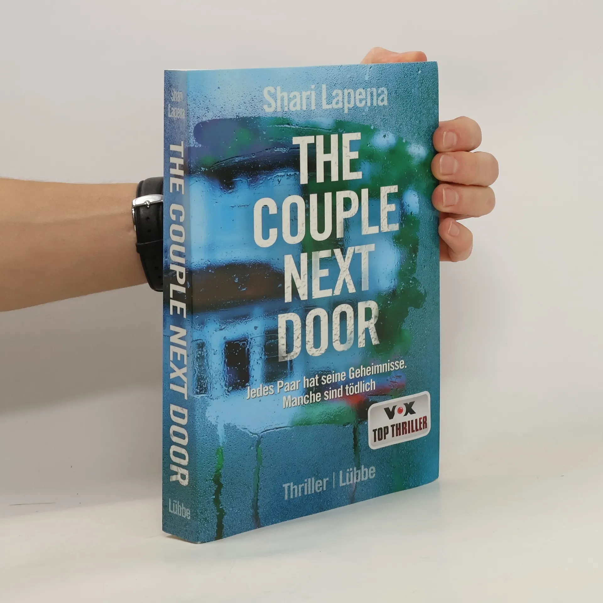 The Couple Next Door | Book | Hardcover | Shari Lapena | DE