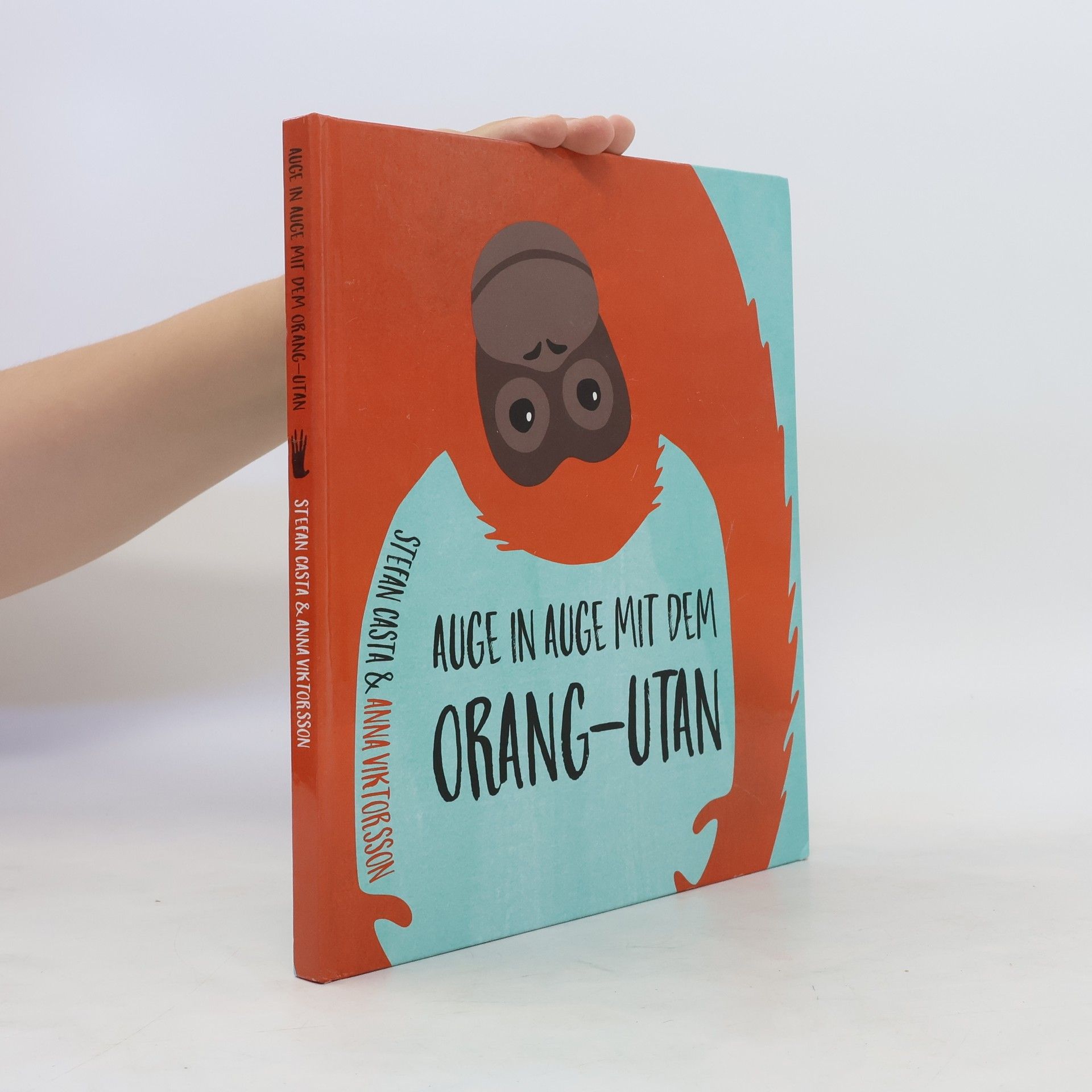 Stefan Casta Auge in Auge mit dem Orang-utan