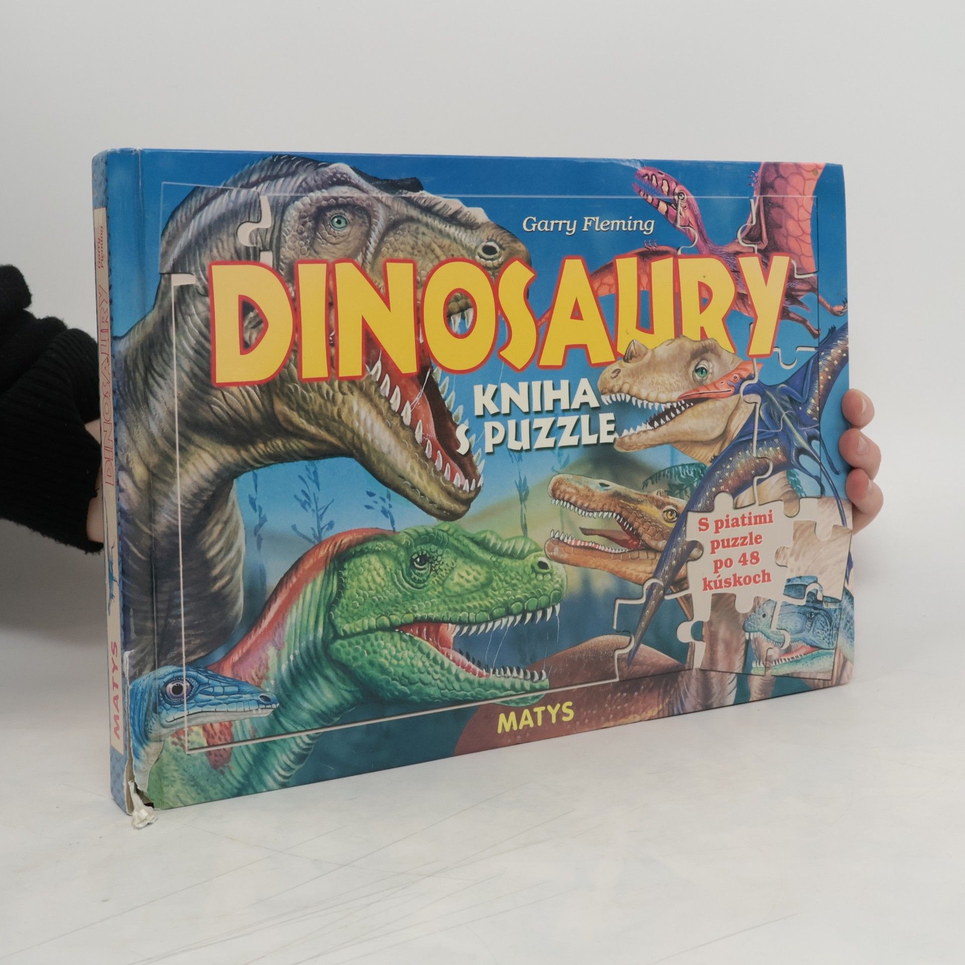 Garry Fleming Dinosaury - kniha s puzzle