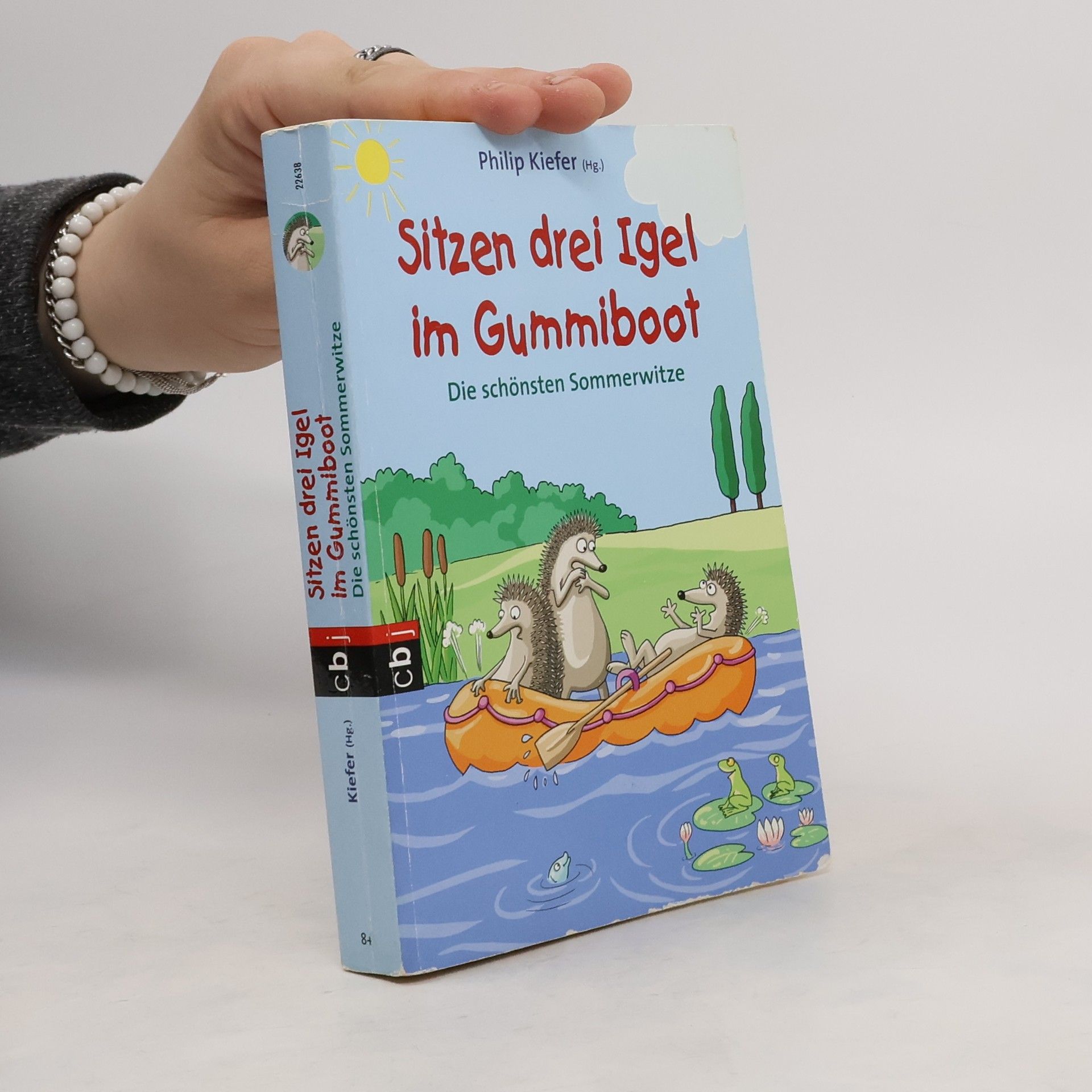Philip Kiefer Sitzen drei Igel im Gummiboot