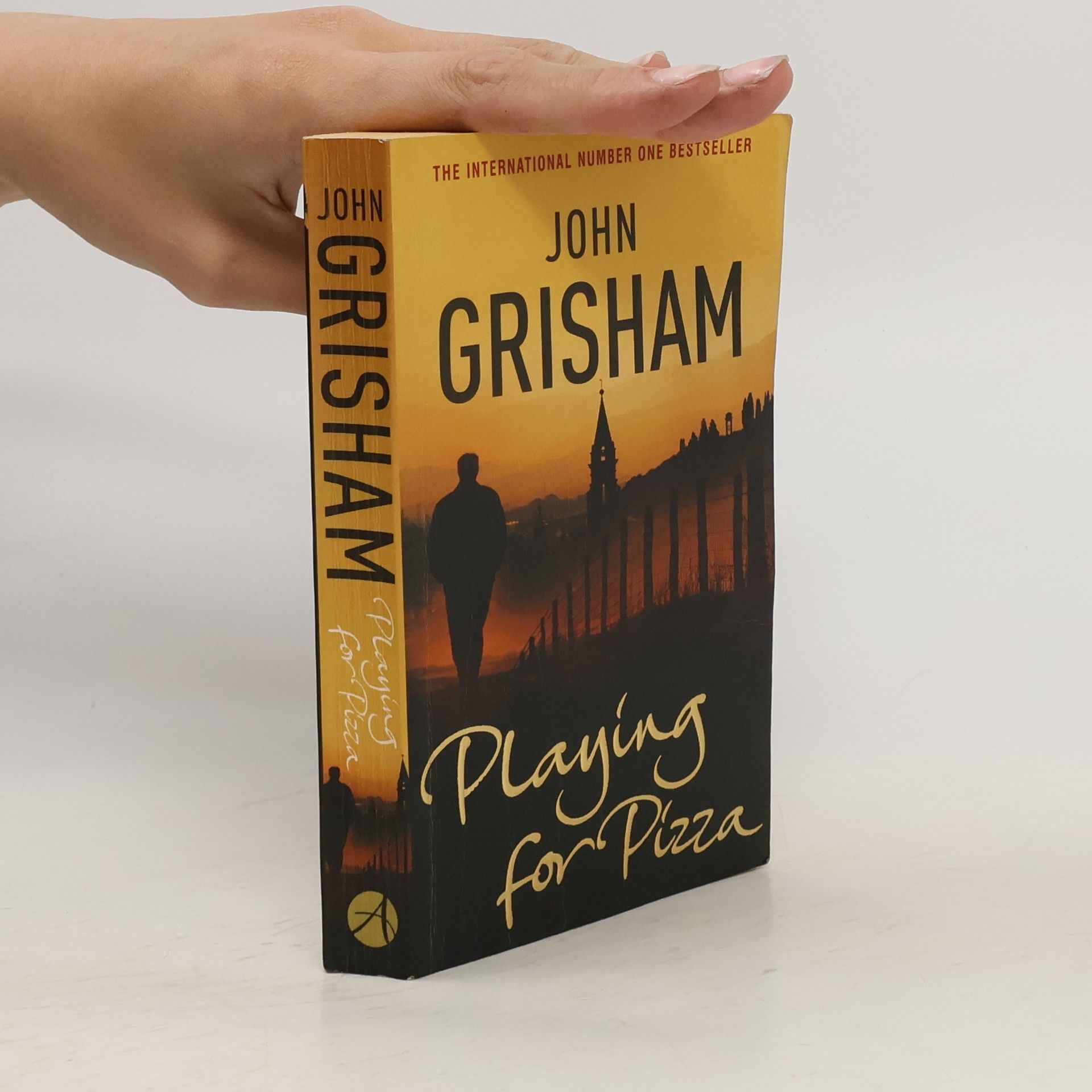 John Grisham Playing for pizza