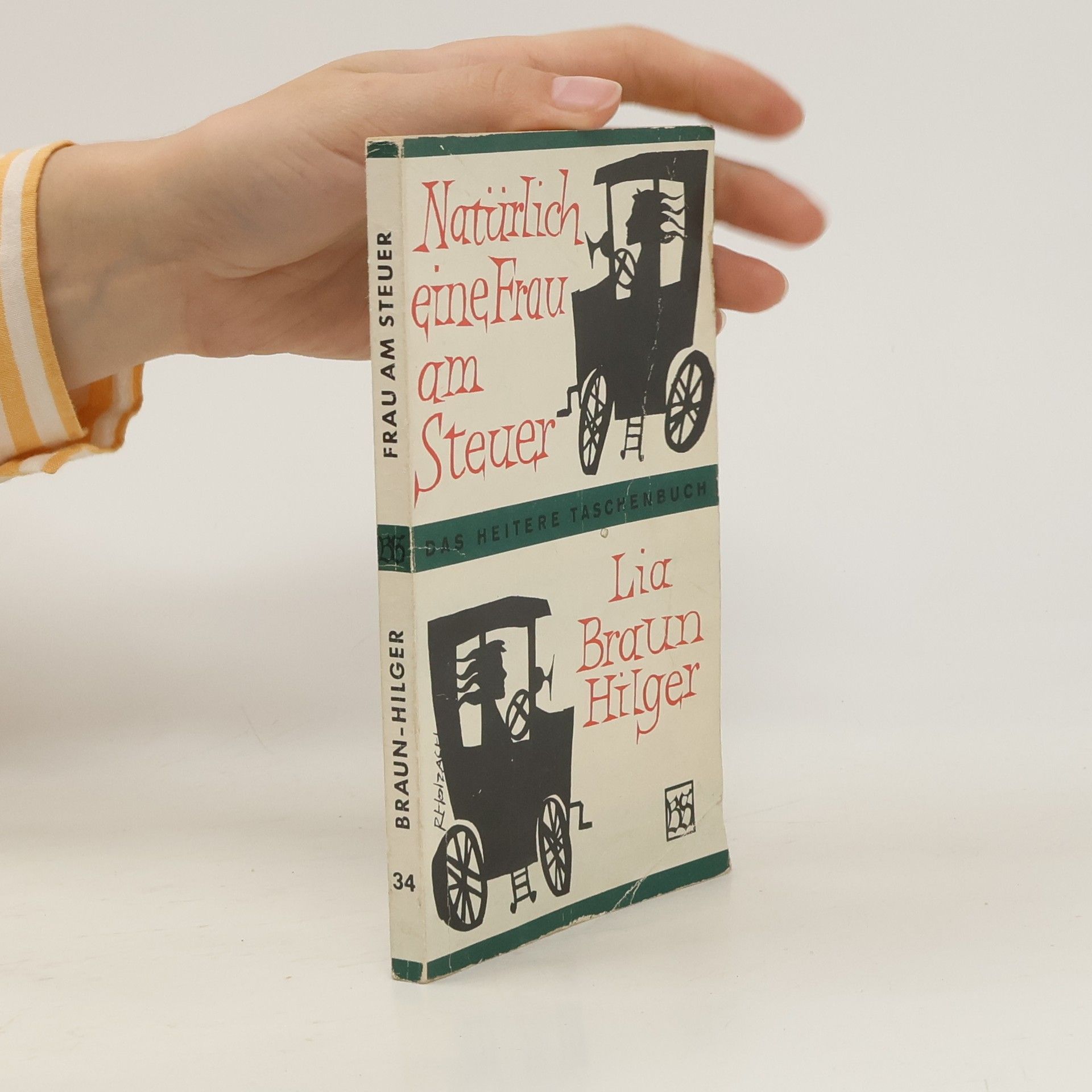 Natürlich eine Frau am Steuer