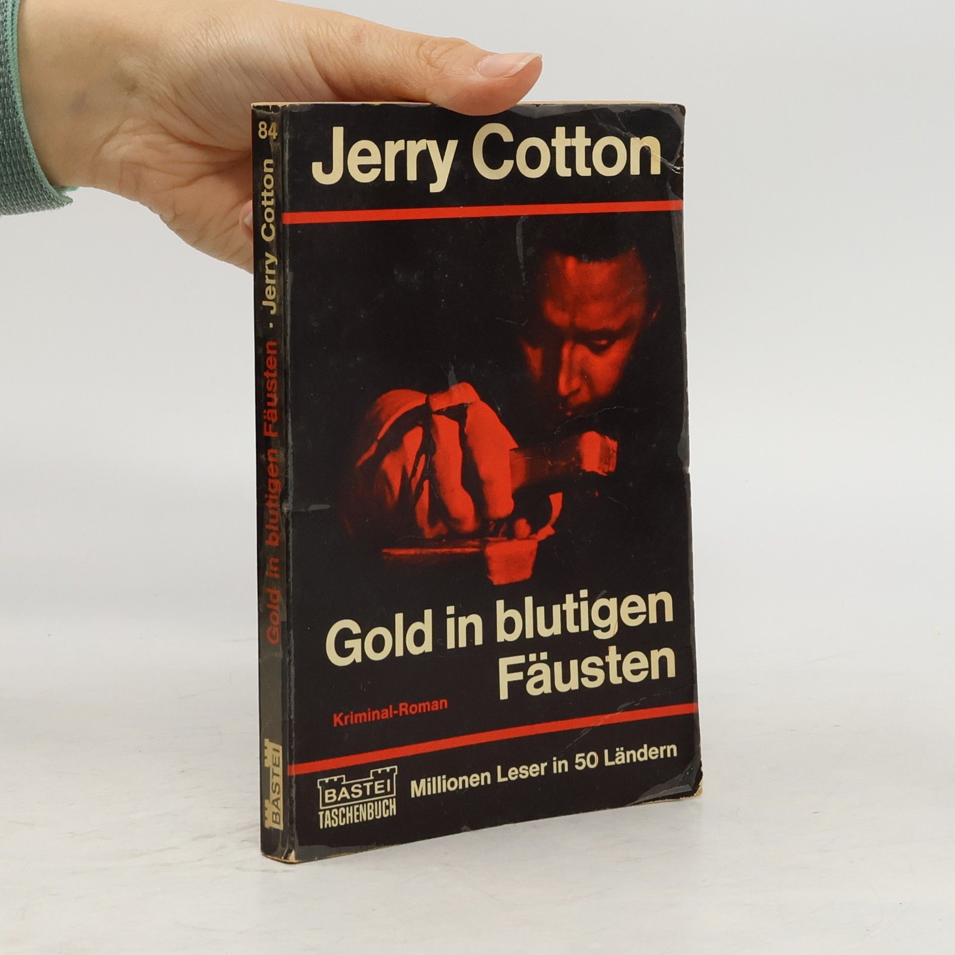 Jerry Cotton Gold in blutigen Fäusten