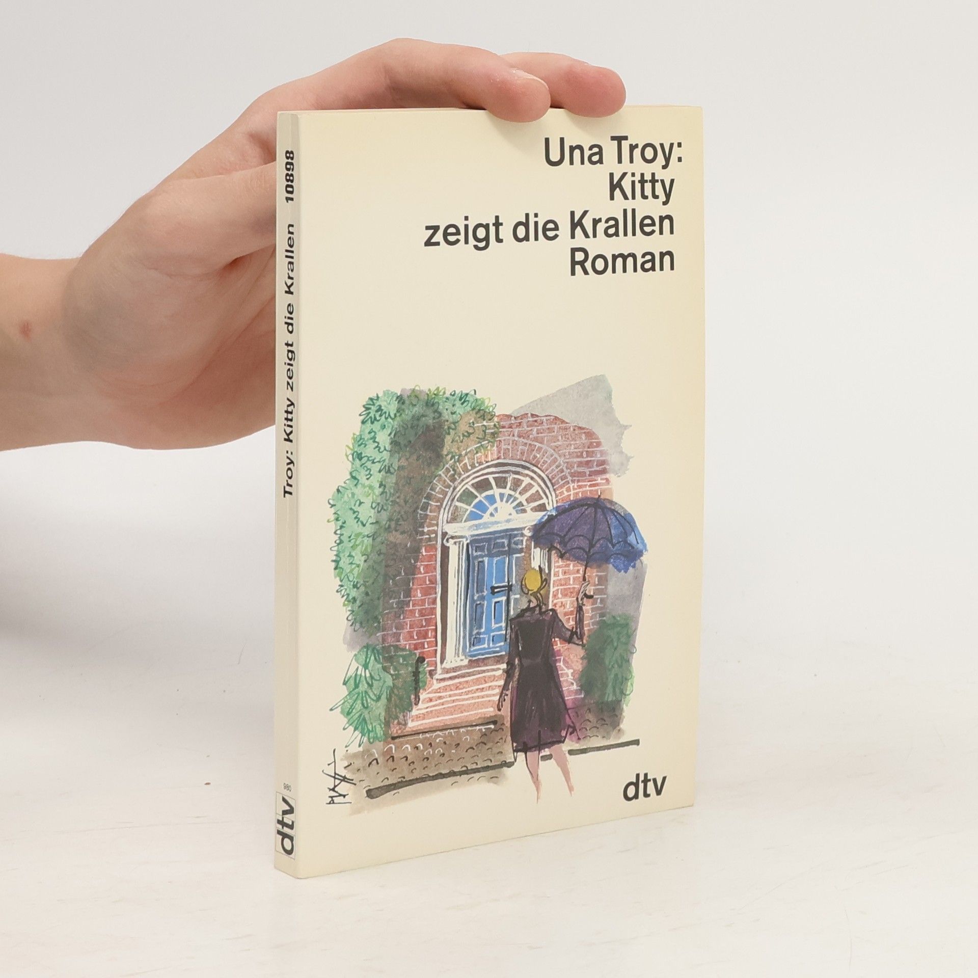 Una Troy Kitty zeigt die Krallen