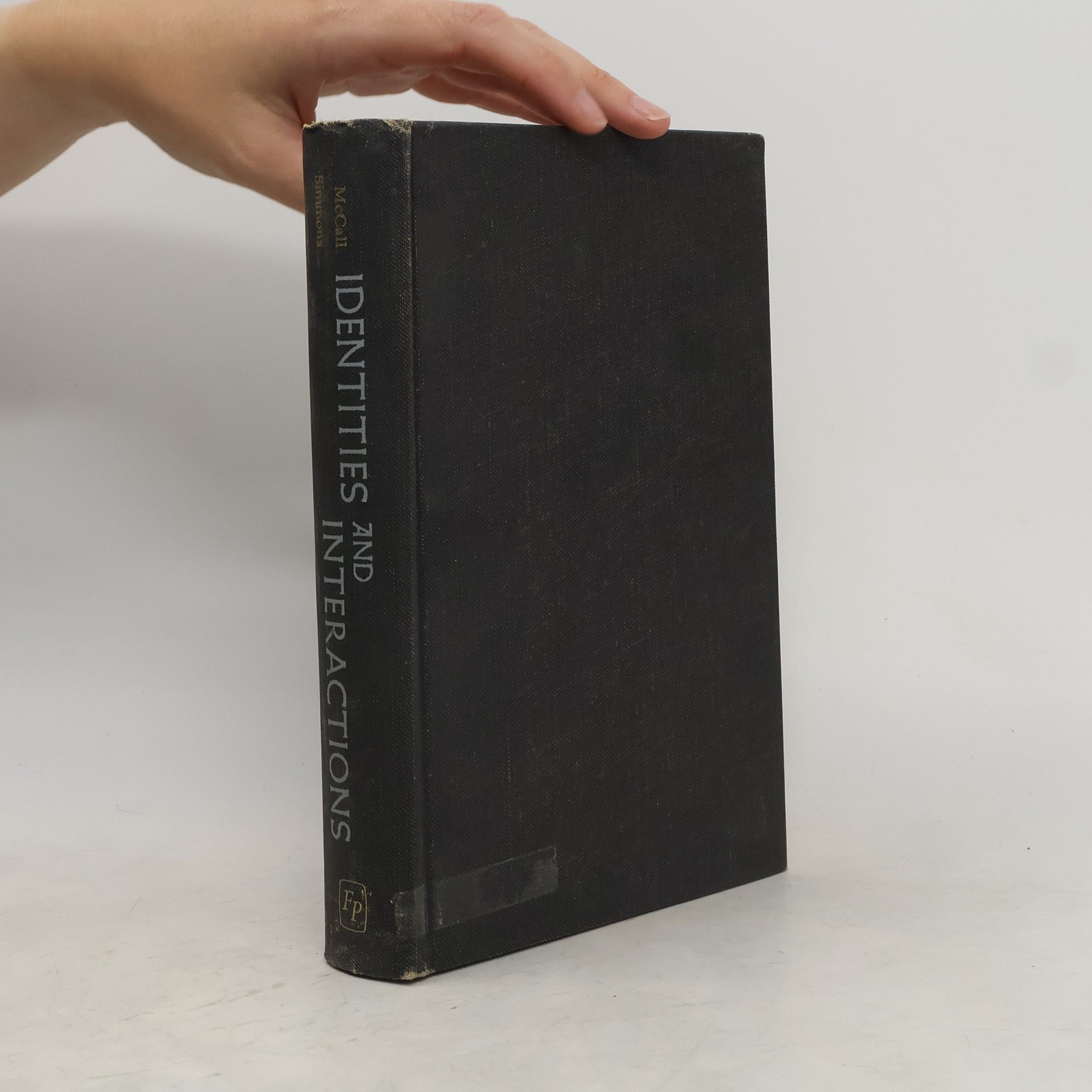 George J. McCall Identities and Interactions