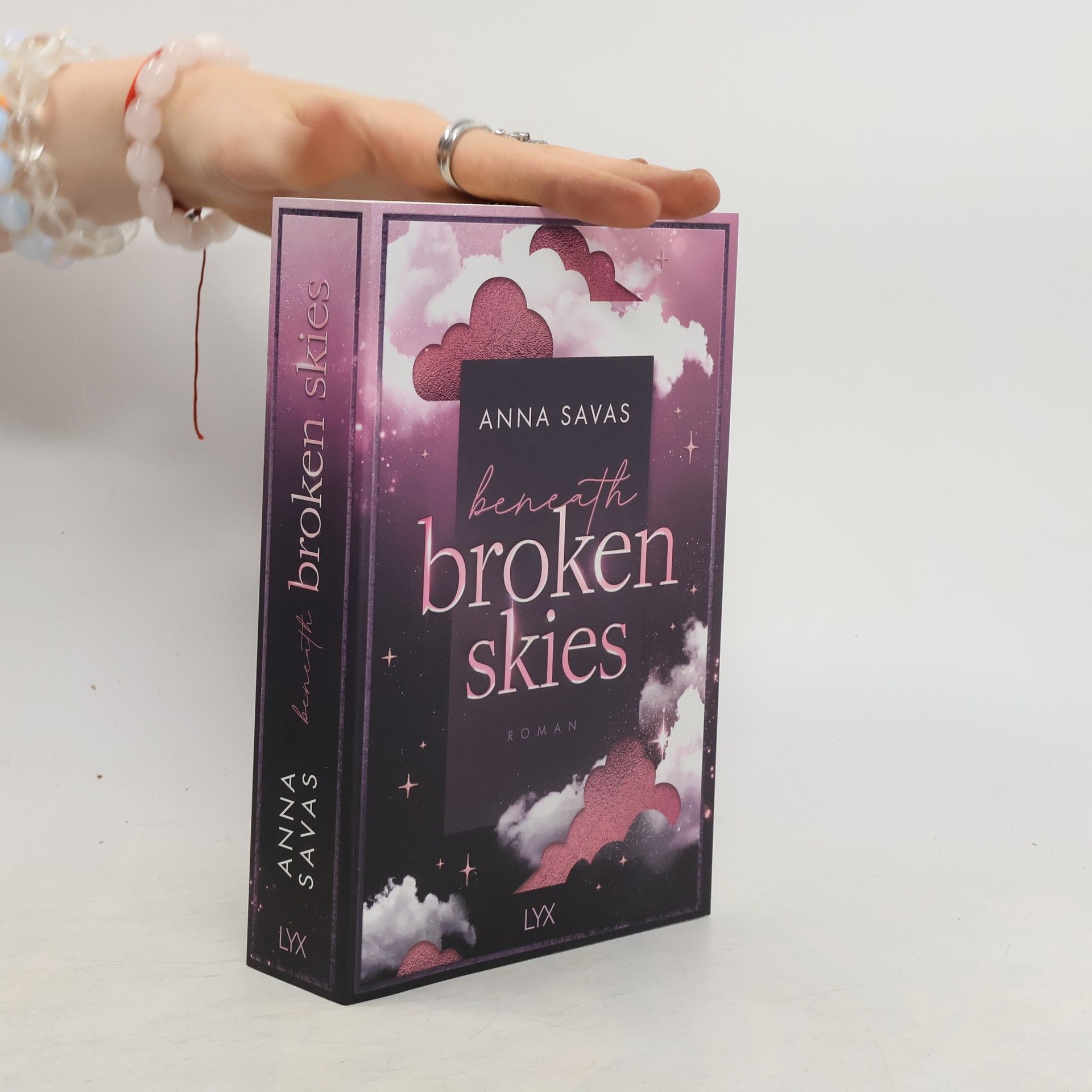 Anna Savas Beneath Broken Skies