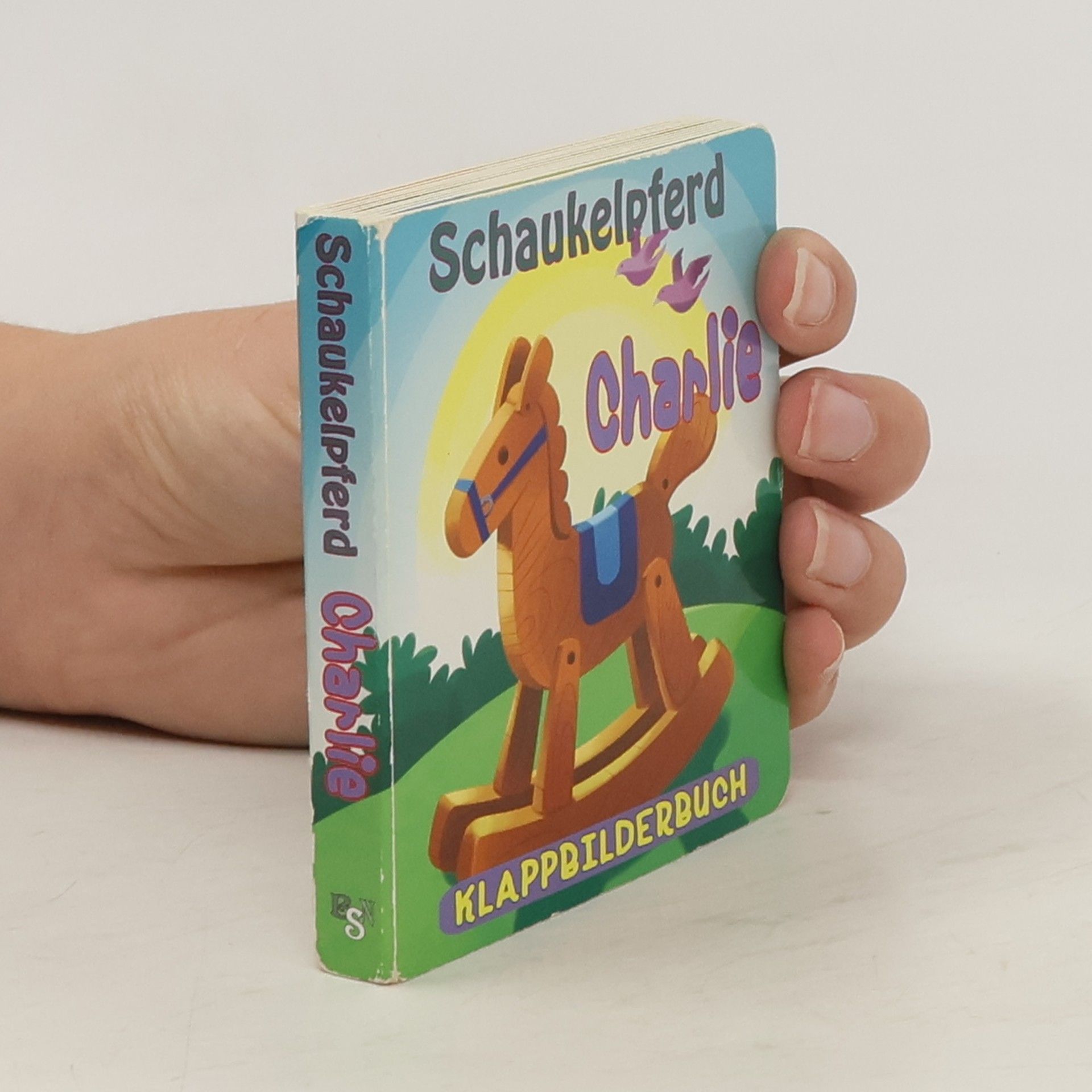 AA.VV. Schaukelpferd Charlie