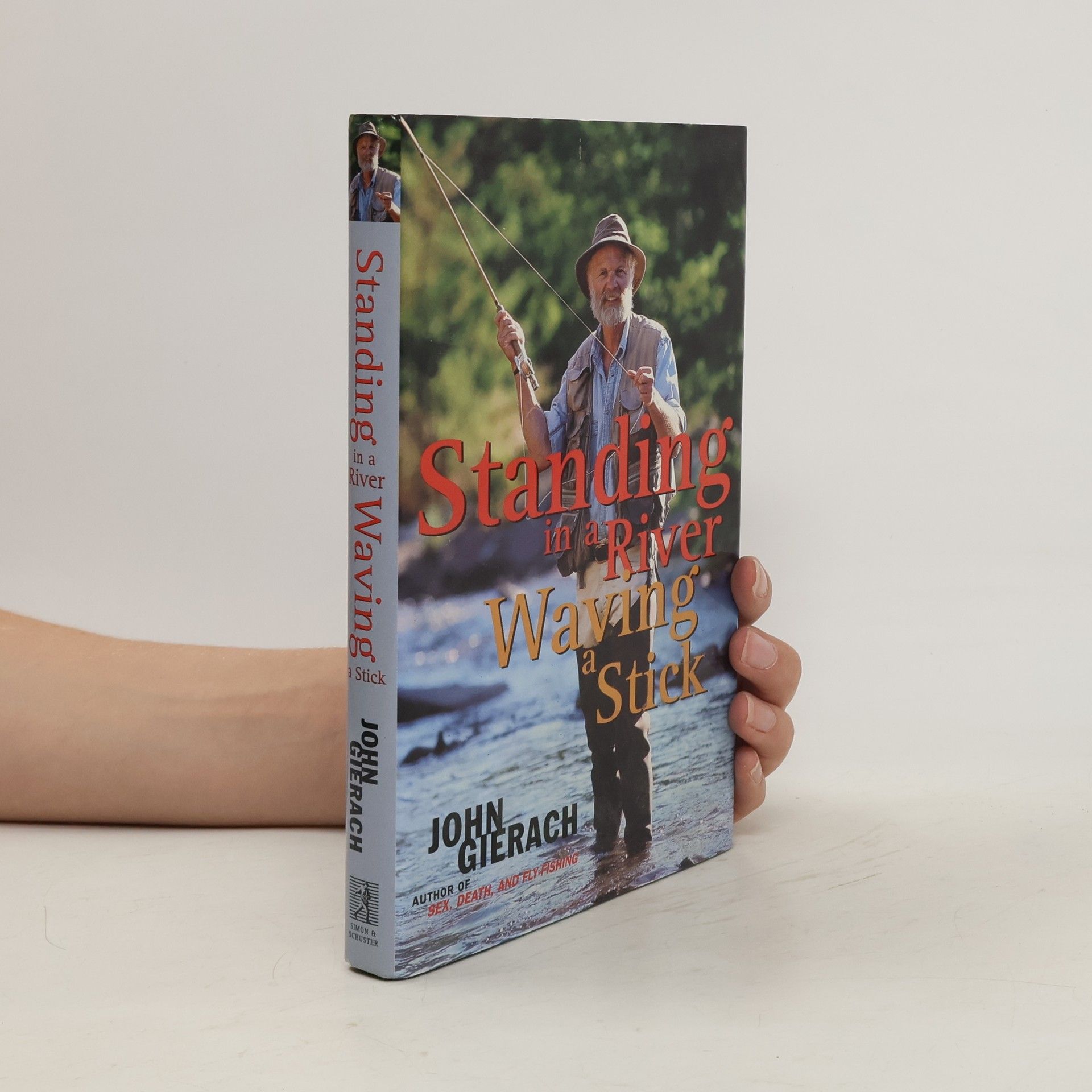 John Gierach Standing in a River Waving a Stick