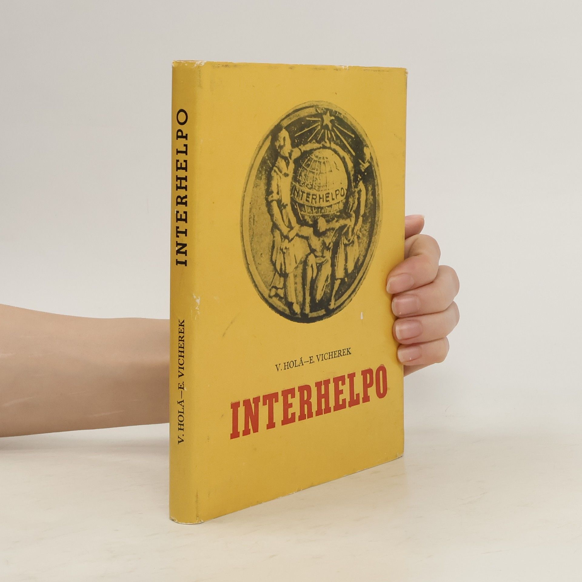 V. Holá Interhelpo