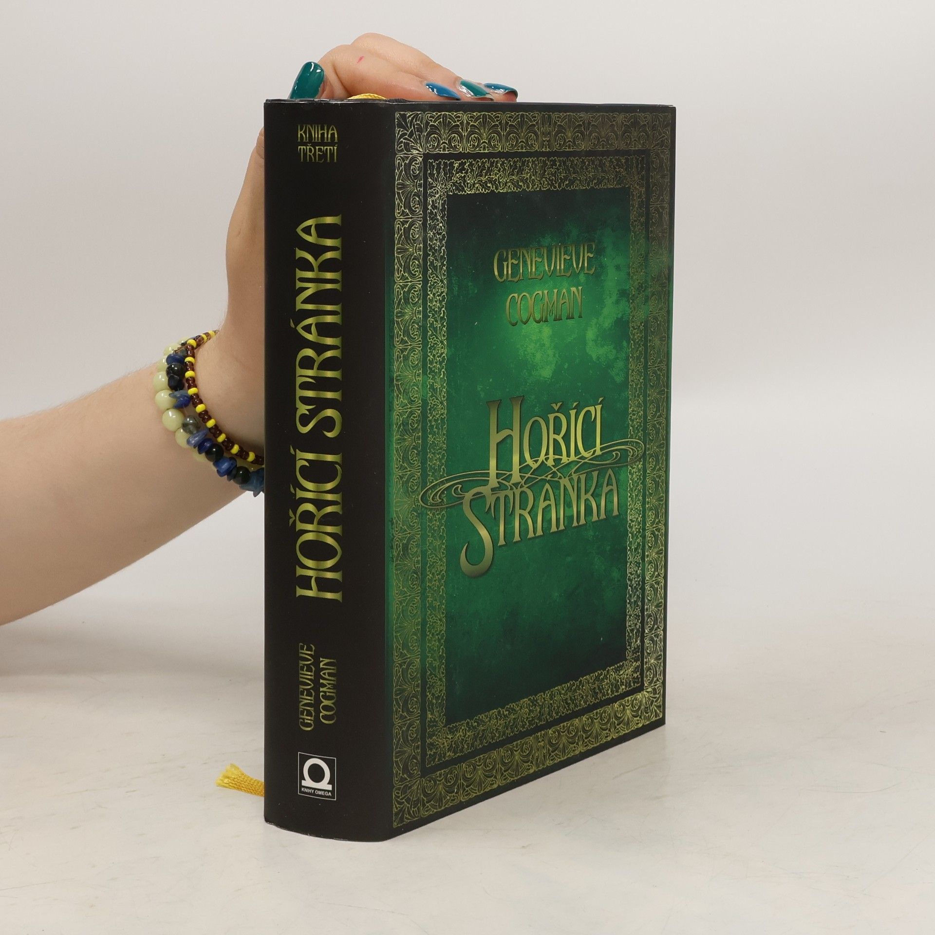 Genevieve Cogman Neviditelná knihovna. Kniha třetí. Hořící stránka