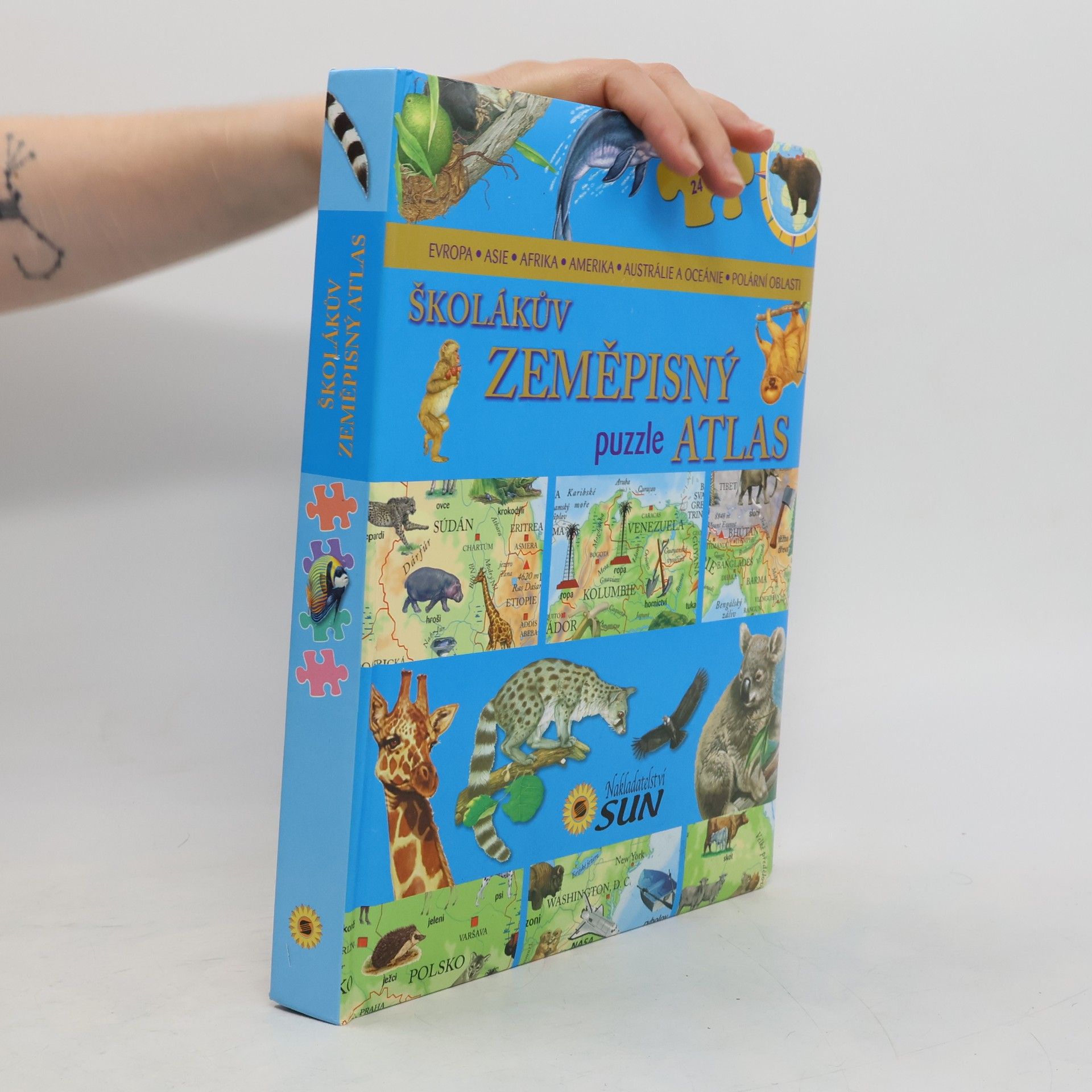Karolína Schwarzová Školákův zeměpisný puzzle atlas : Evropa, Asie, Afrika, Amerika, Austrálie a Oceánie, polární oblasti