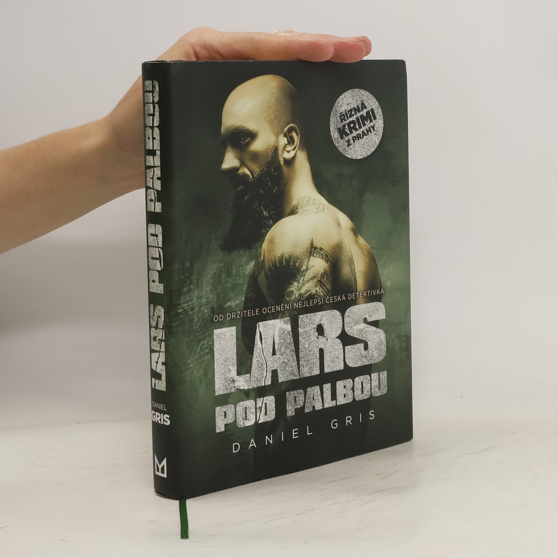 Daniel Gris Lars pod palbou