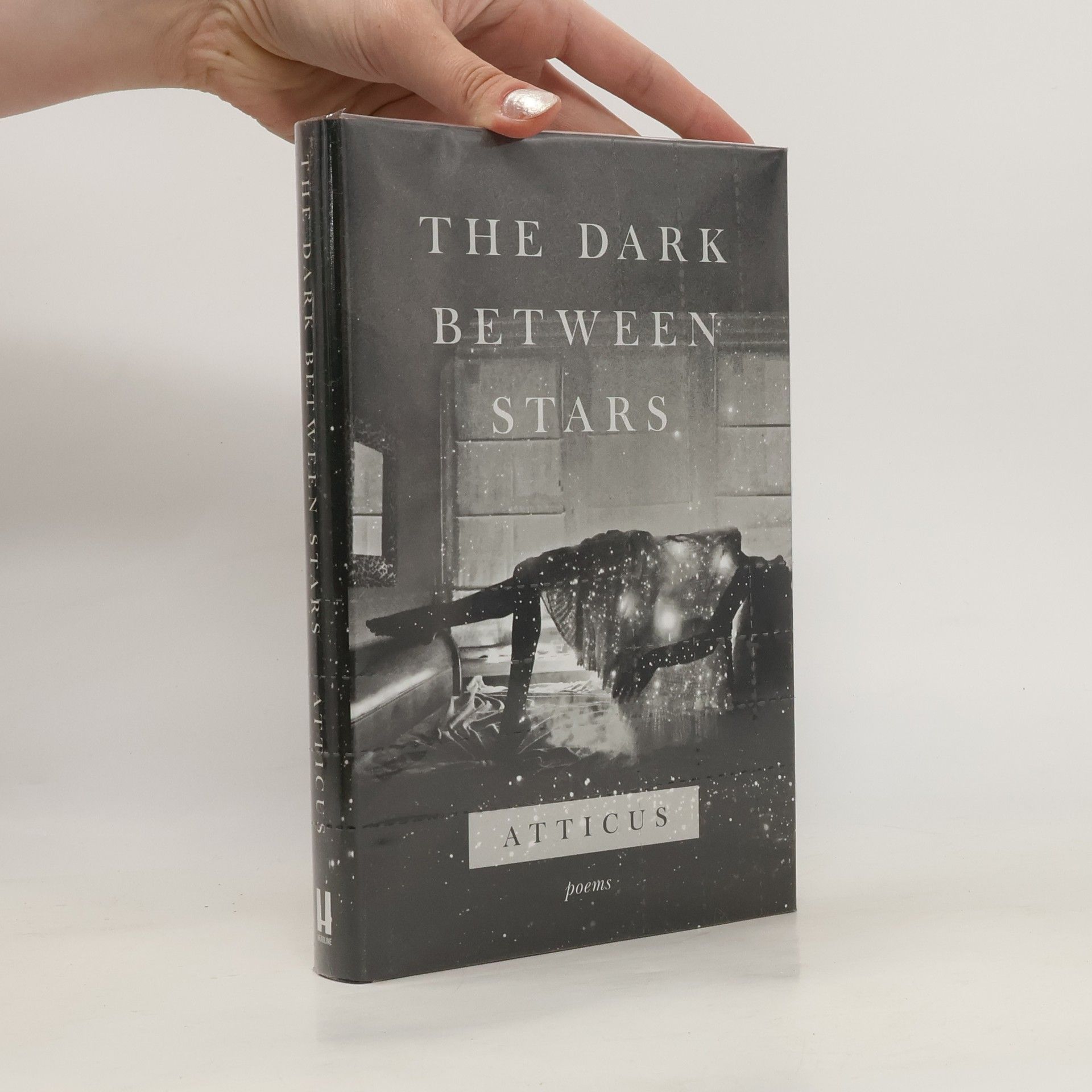 Atticus The dark between stars: Poems