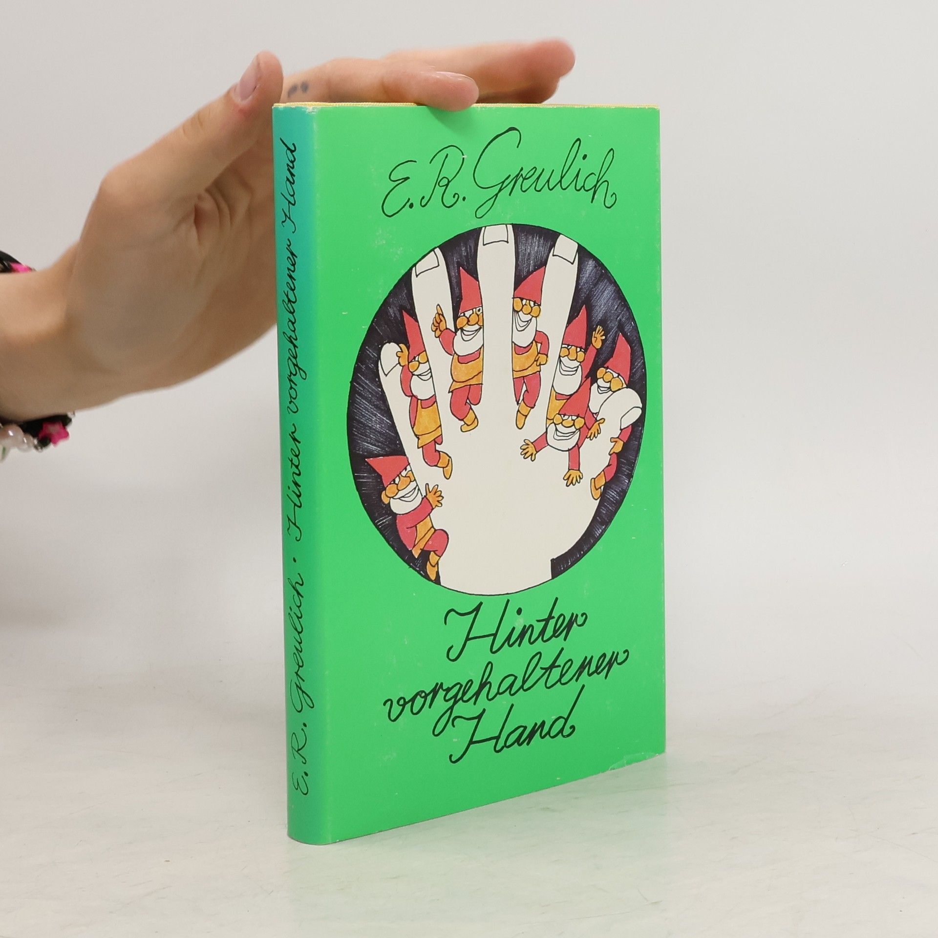 E. R. Greulich Hinter vorgehaltener Hand