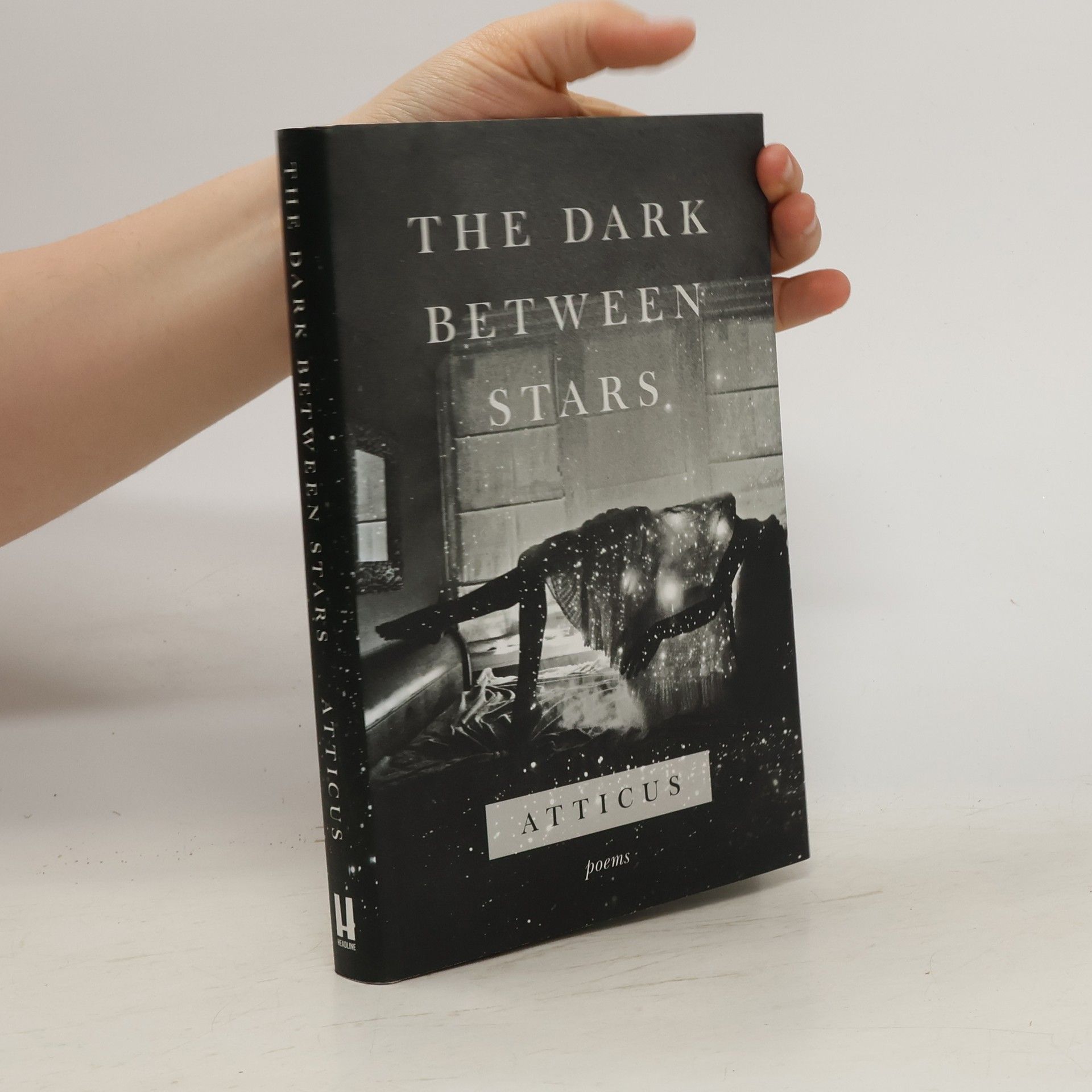 Atticus The dark between stars: Poems