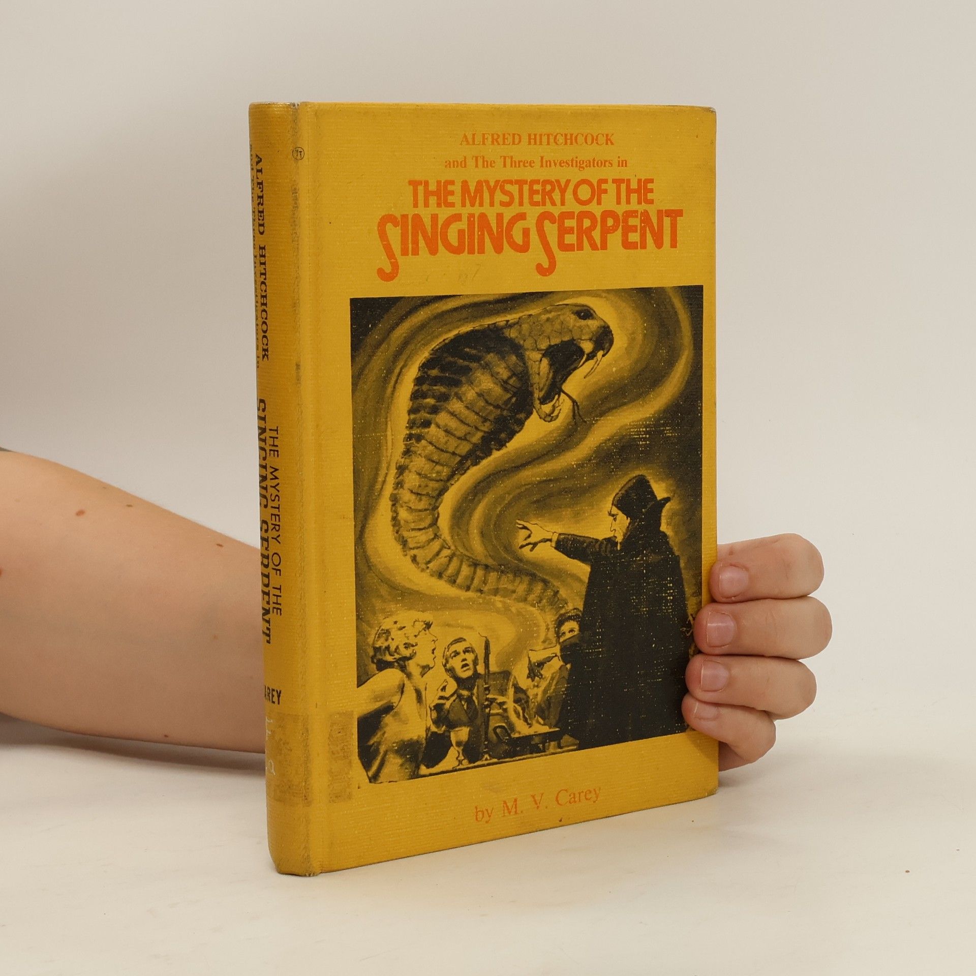 M. V. Carey Alfred Hitchcock and the Three Investigators in The Mystery of the Singing Serpent
