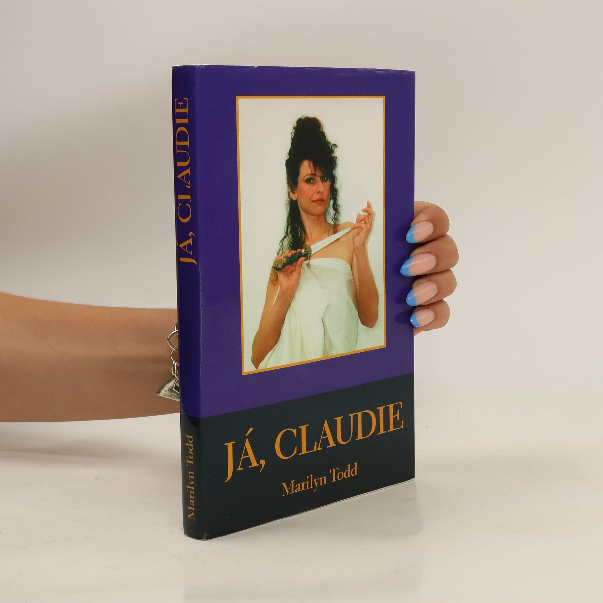 Marilyn Todd Já, Claudie