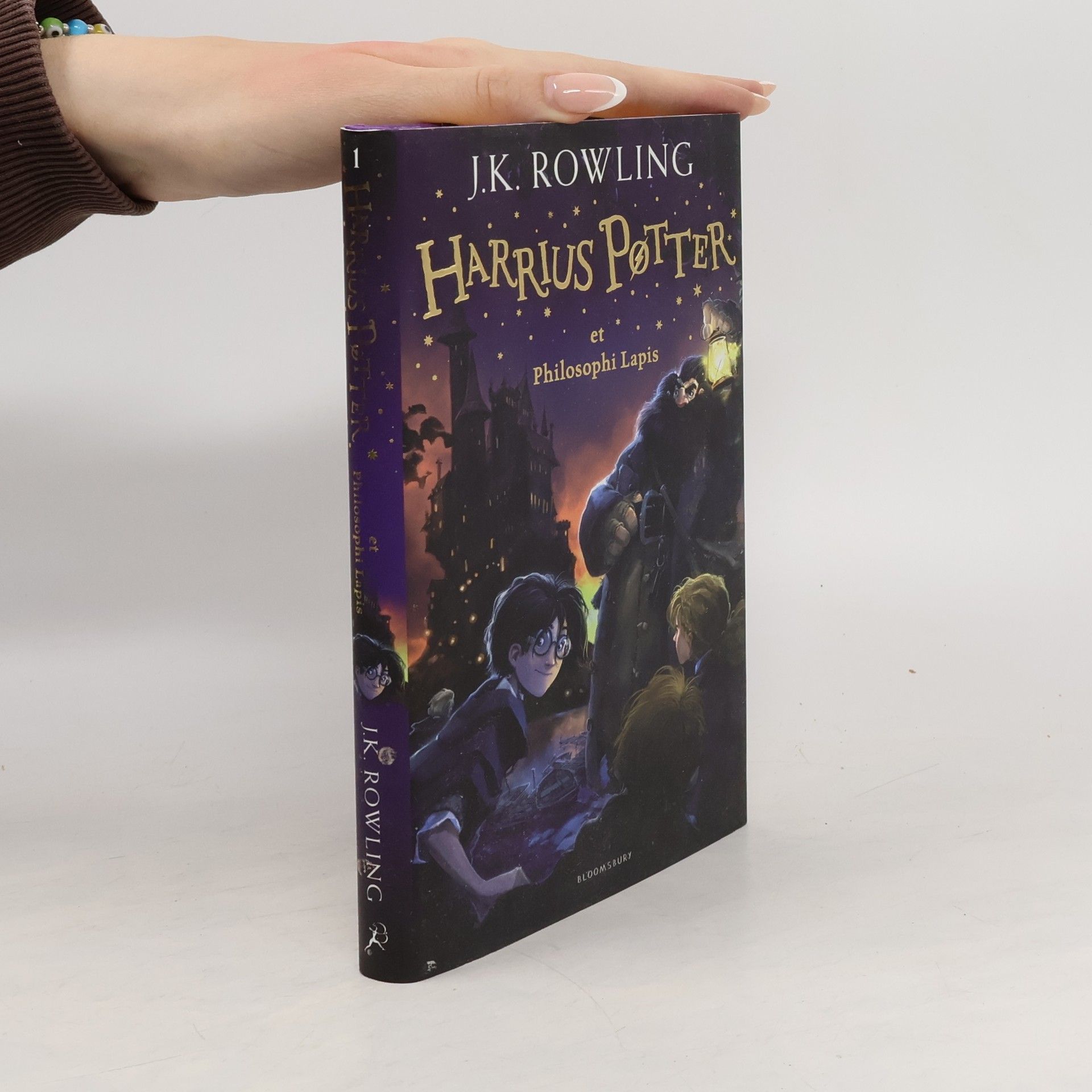 J. K. Rowling Harrius Potter et Philosophi Lapis
