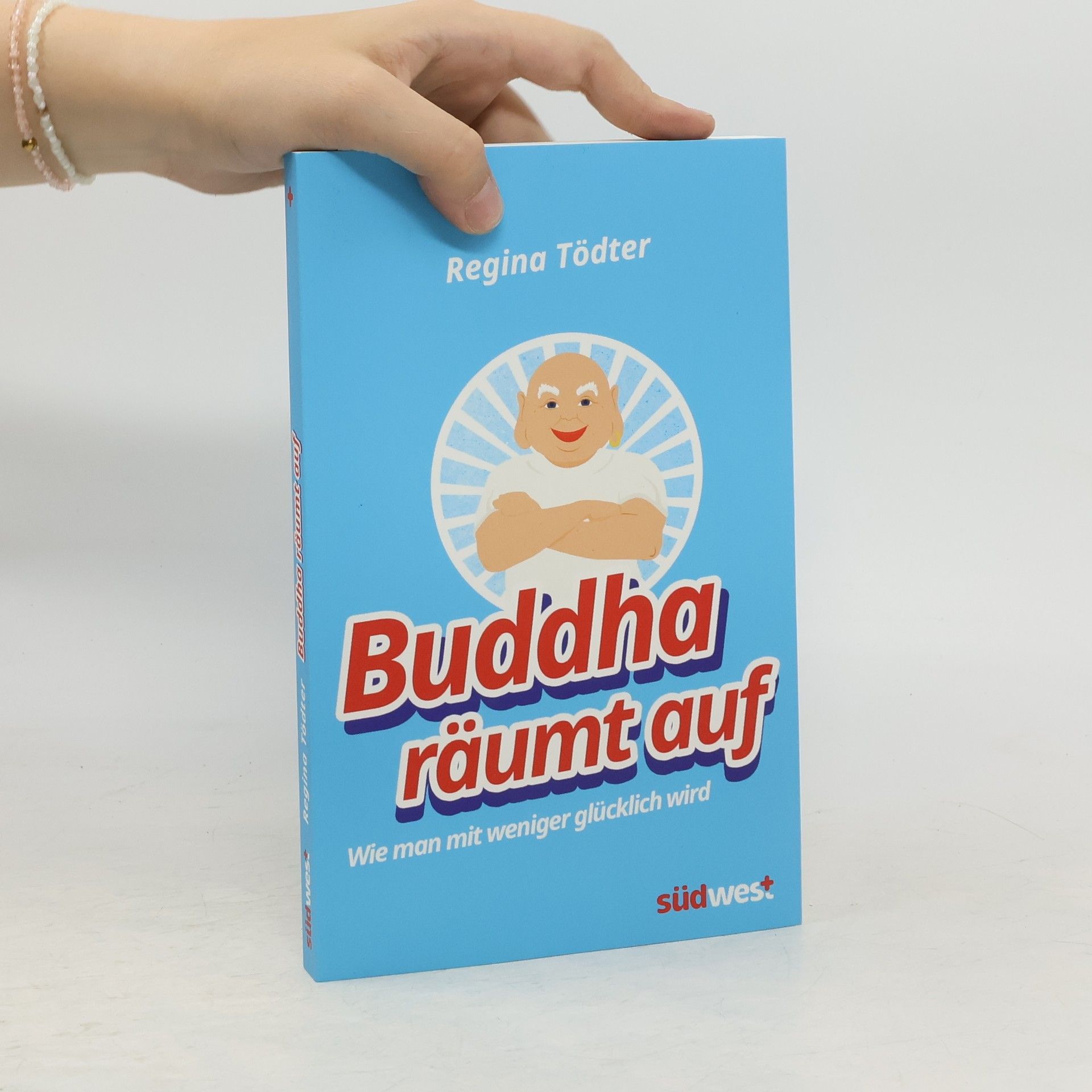 Regina Tödter Buddha räumt auf