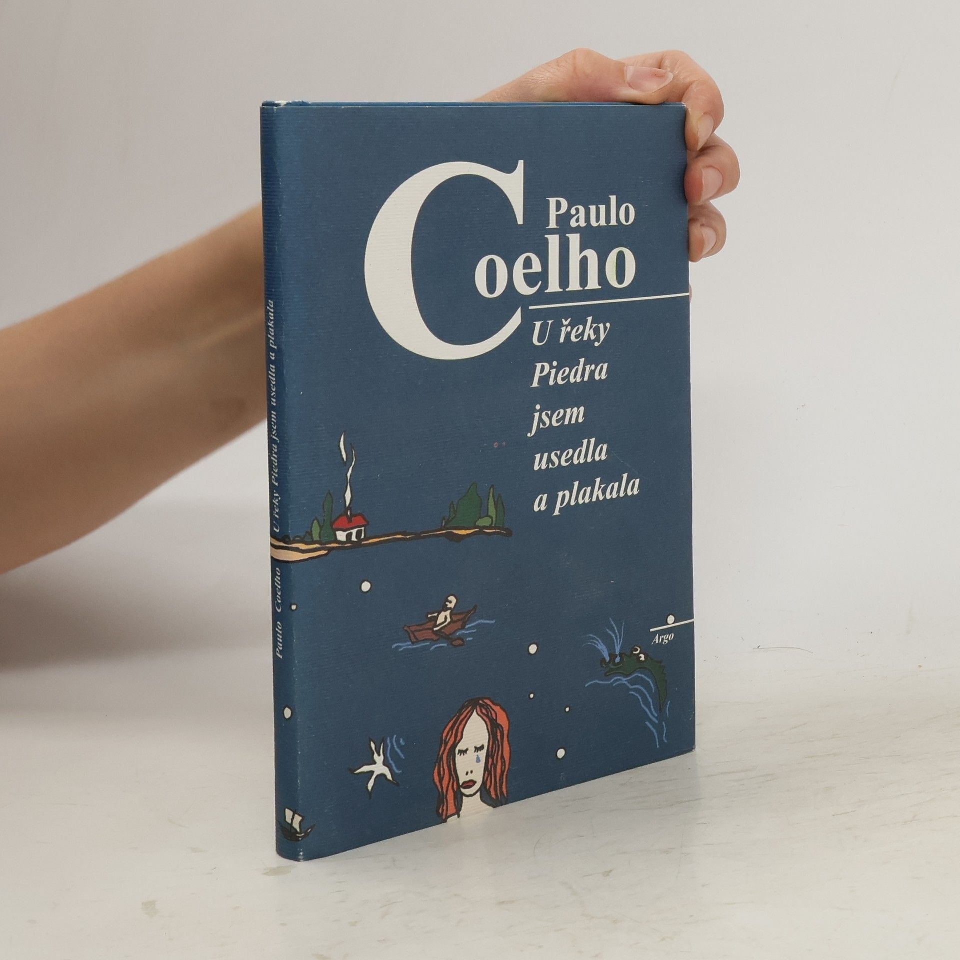 Paulo Coelho U řeky Piedra jsem usedla a plakala