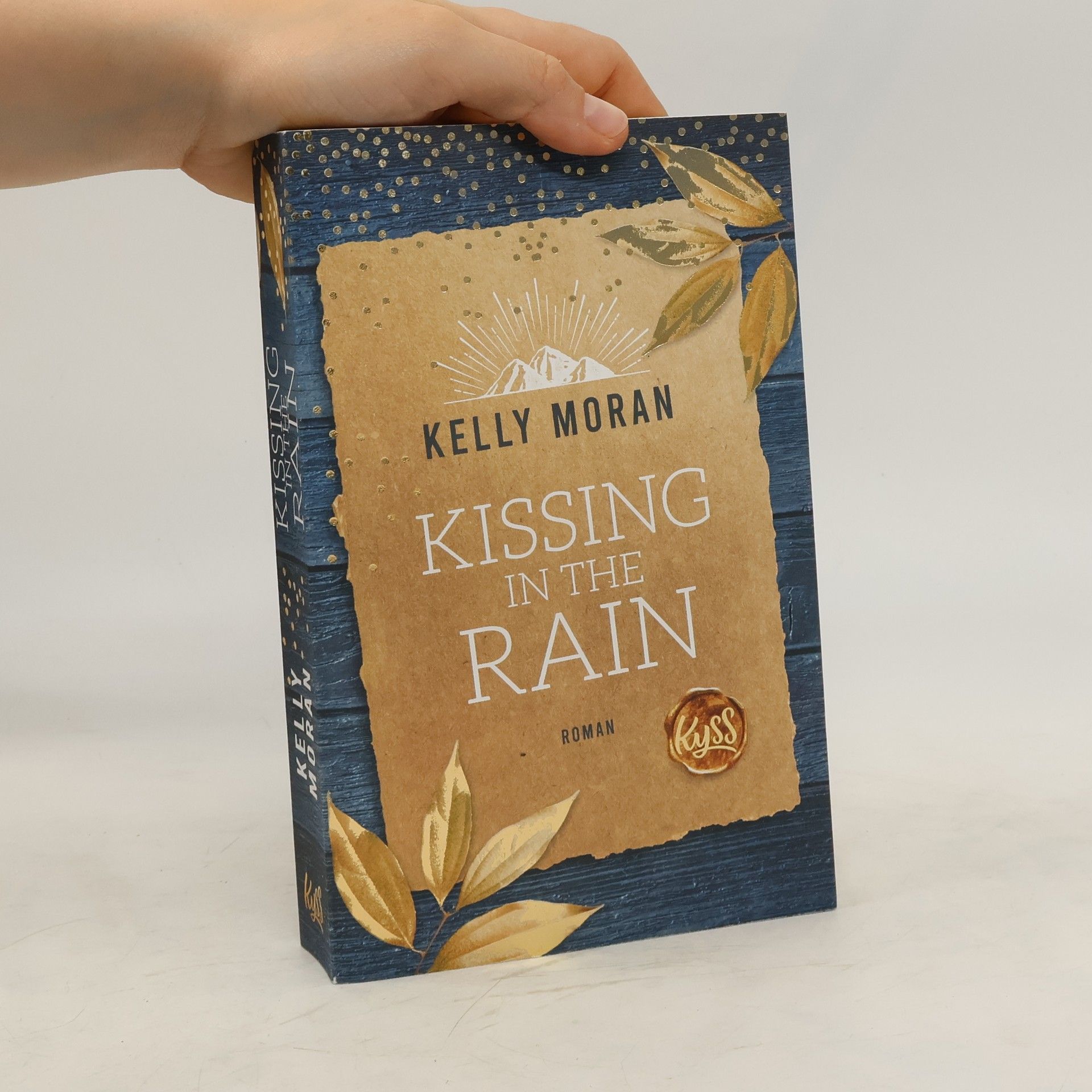 Kelly Moran Kissing in the Rain