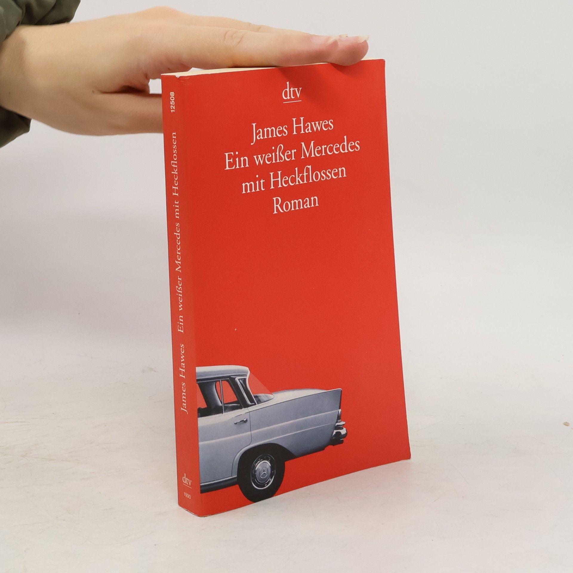 James Hawes Ein weißer Mercedes mit Heckflossen